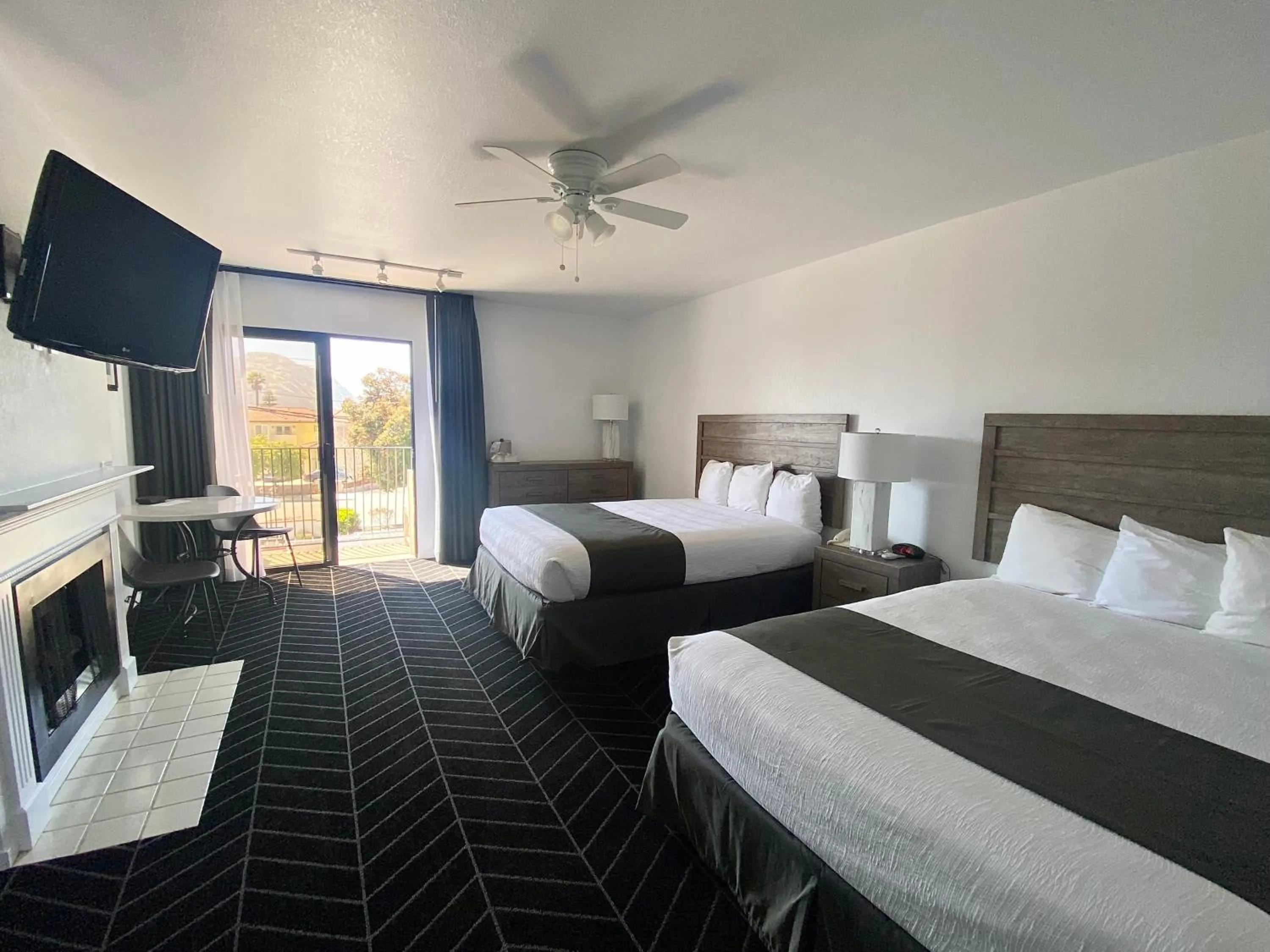 Bed in Masterpiece Hotel