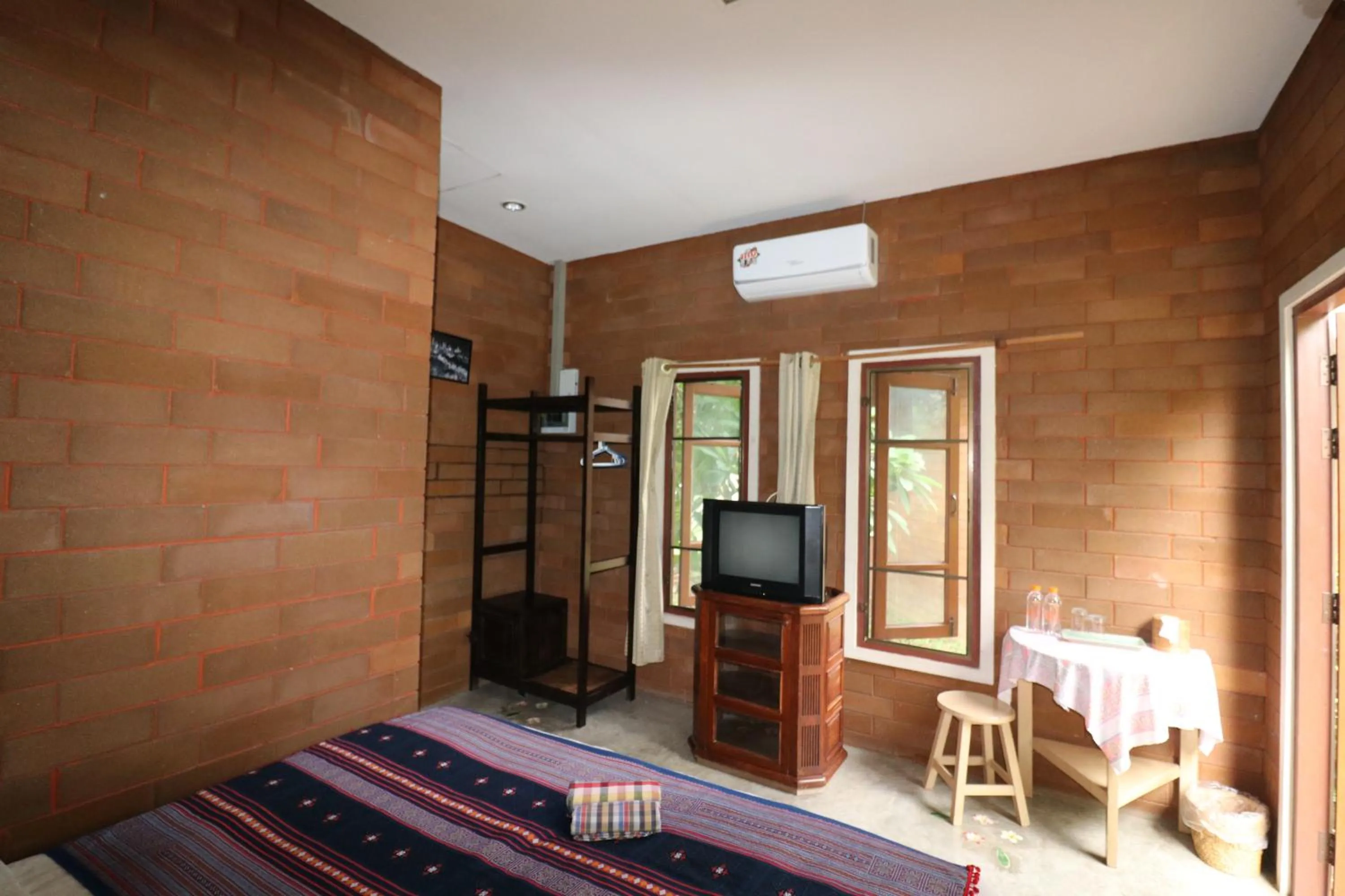 TV and multimedia, TV/Entertainment Center in GongKaew HuenKum Hotel