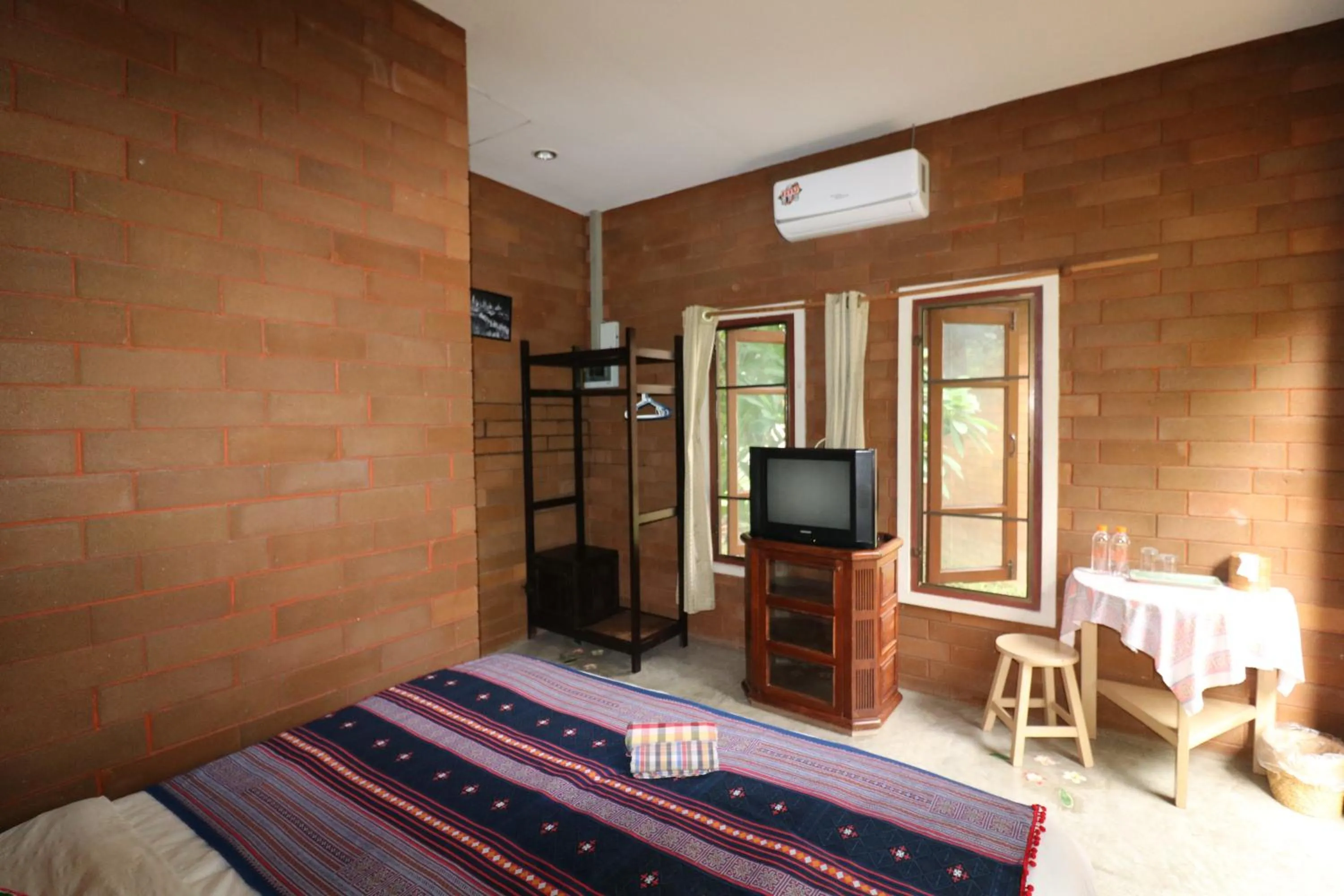 TV and multimedia, TV/Entertainment Center in GongKaew HuenKum Hotel