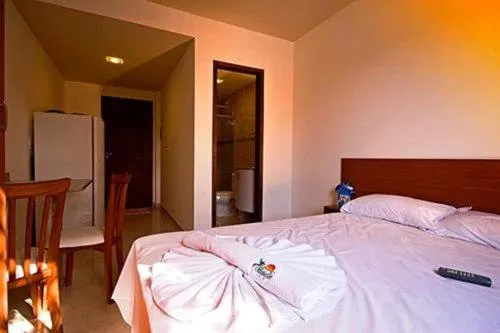 Bed in Pousada Beija Flor