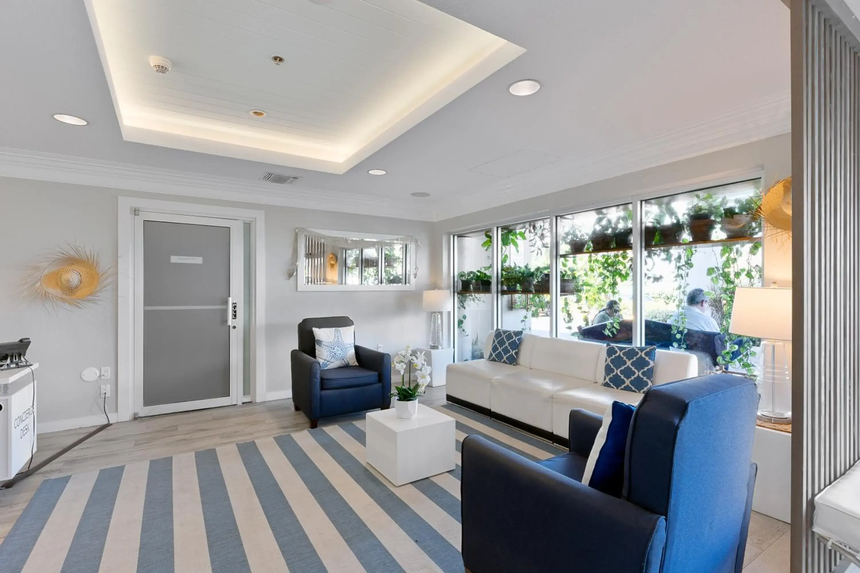 Lobby or reception in Holiday Inn Resort Grand Cayman by IHG Lobby or reception in Holiday Inn Resort Grand Cayman by IHG