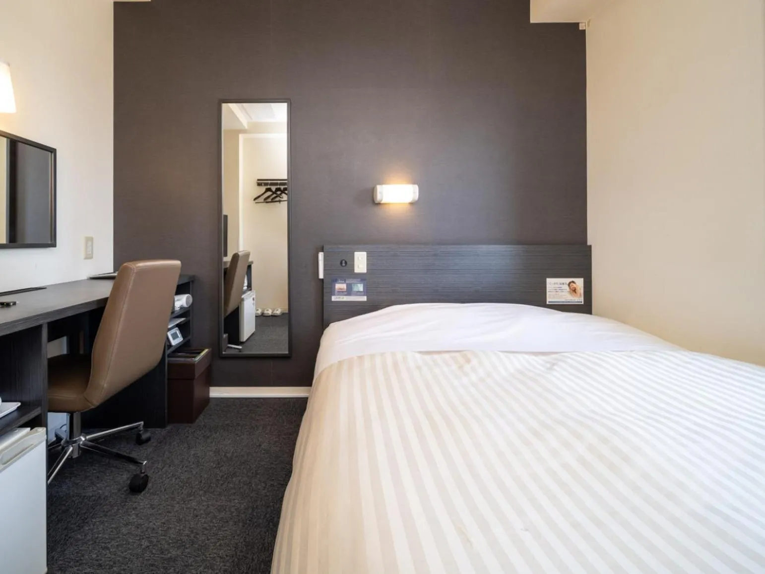 Bed in Super Hotel Asahikawa