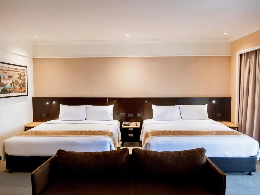 Bed in The Royal River Hotel