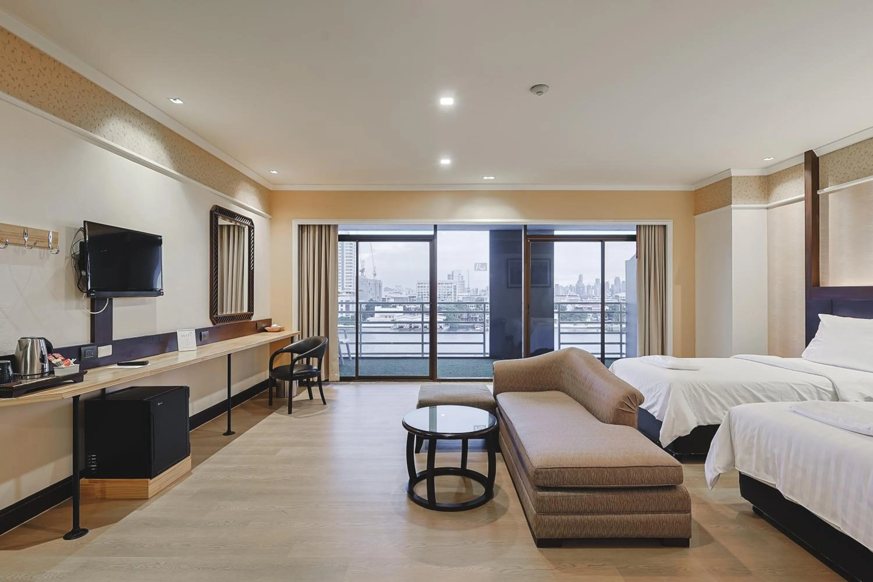 Bed in The Royal River Hotel