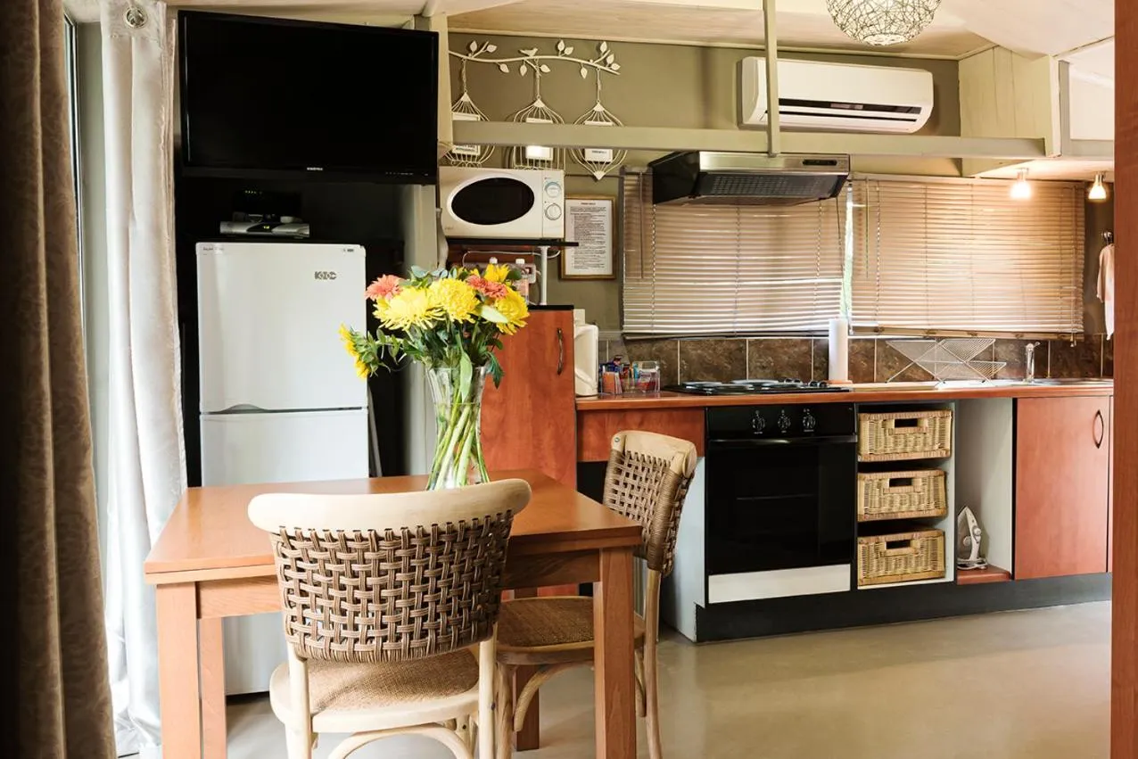 kitchen in Glenda's Guest Suites