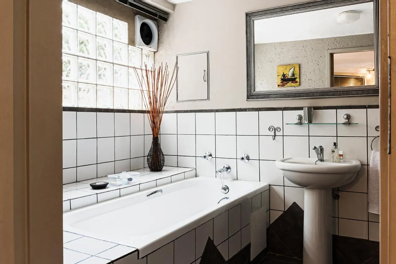 Bathroom in Glenda's Guest Suites