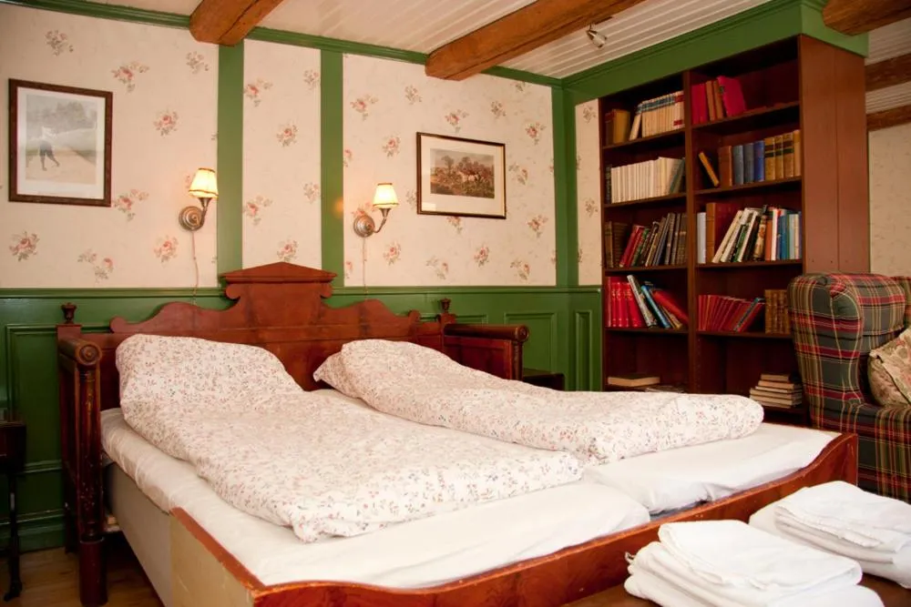 Bed in Garvaregården Hotel , B&B och Café