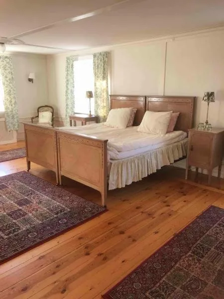 Bed in Garvaregården Hotel , B&B och Café