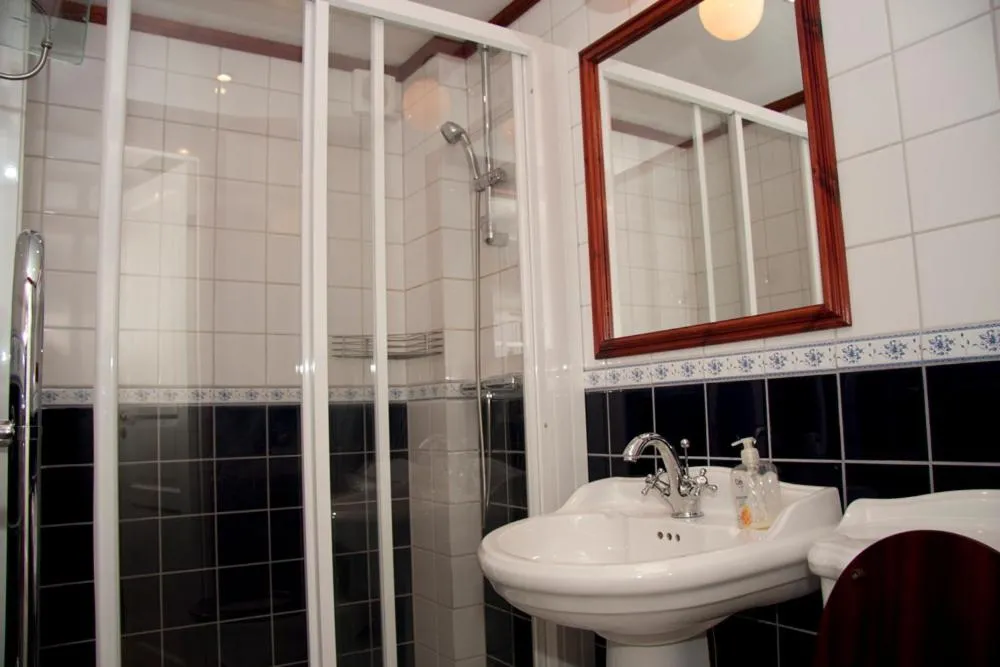 Bathroom in Garvaregården Hotel , B&B och Café