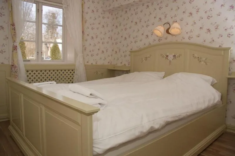 Bed in Garvaregården Hotel , B&B och Café