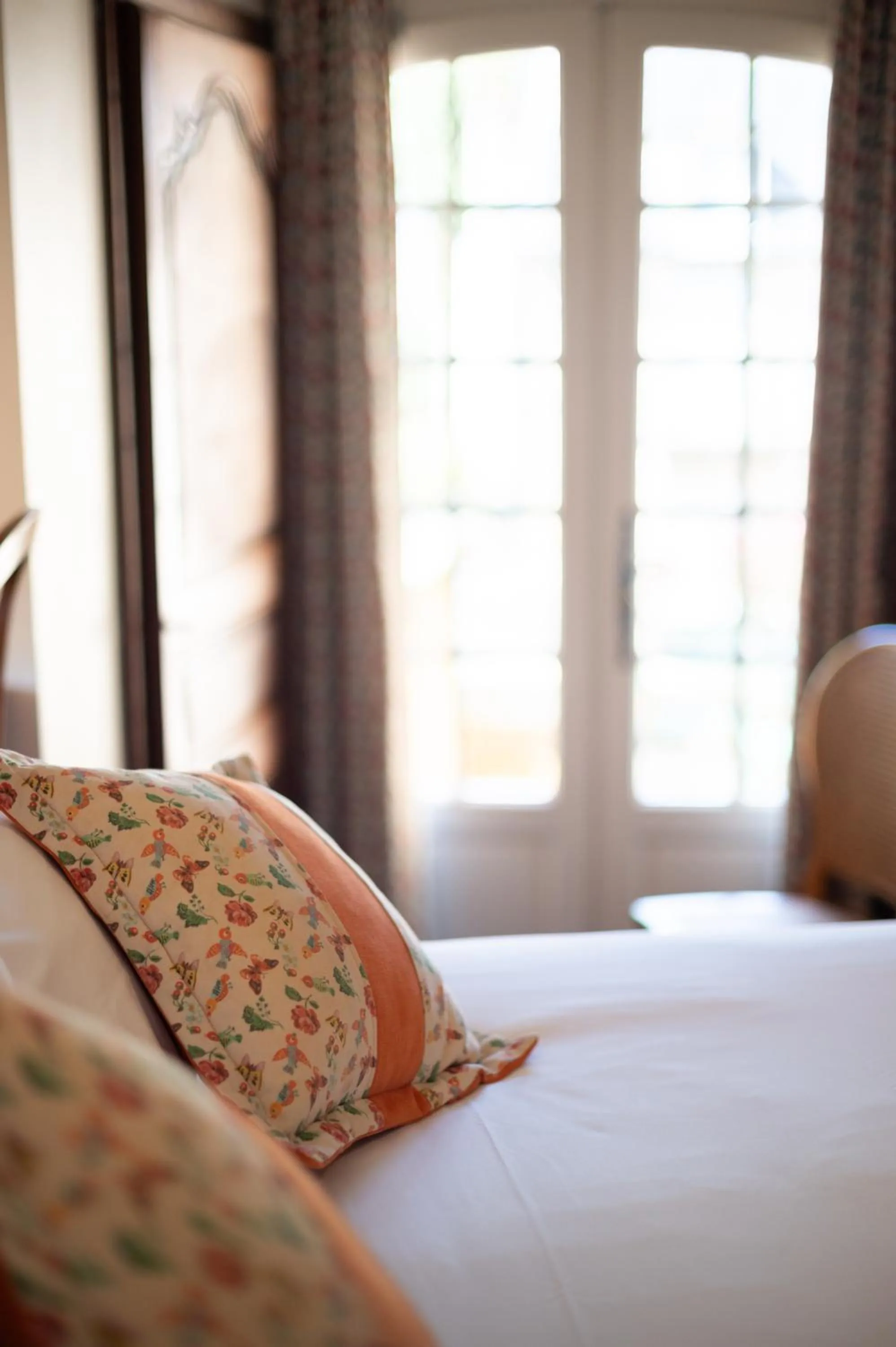Decorative detail, Bed in Hôtel La Couleuvrine Sarlat Centre Ville