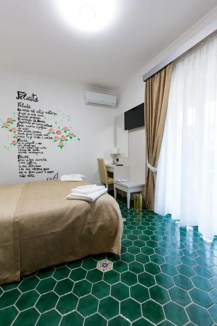 Photo of the whole room in Na' Poesia B&B di Charme