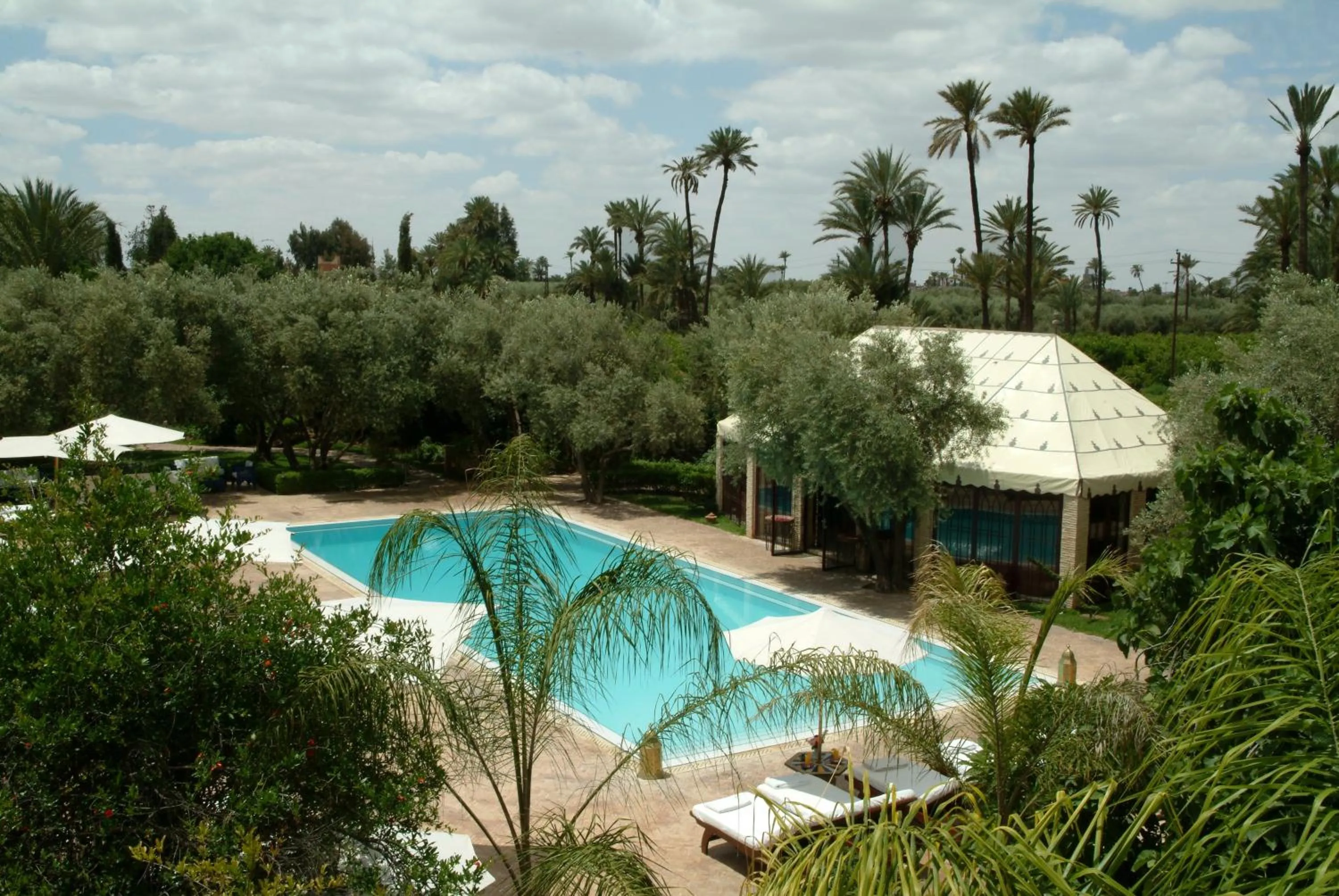 Swimming pool in La Maison Arabe Hotel, Spa & Cooking Workshops