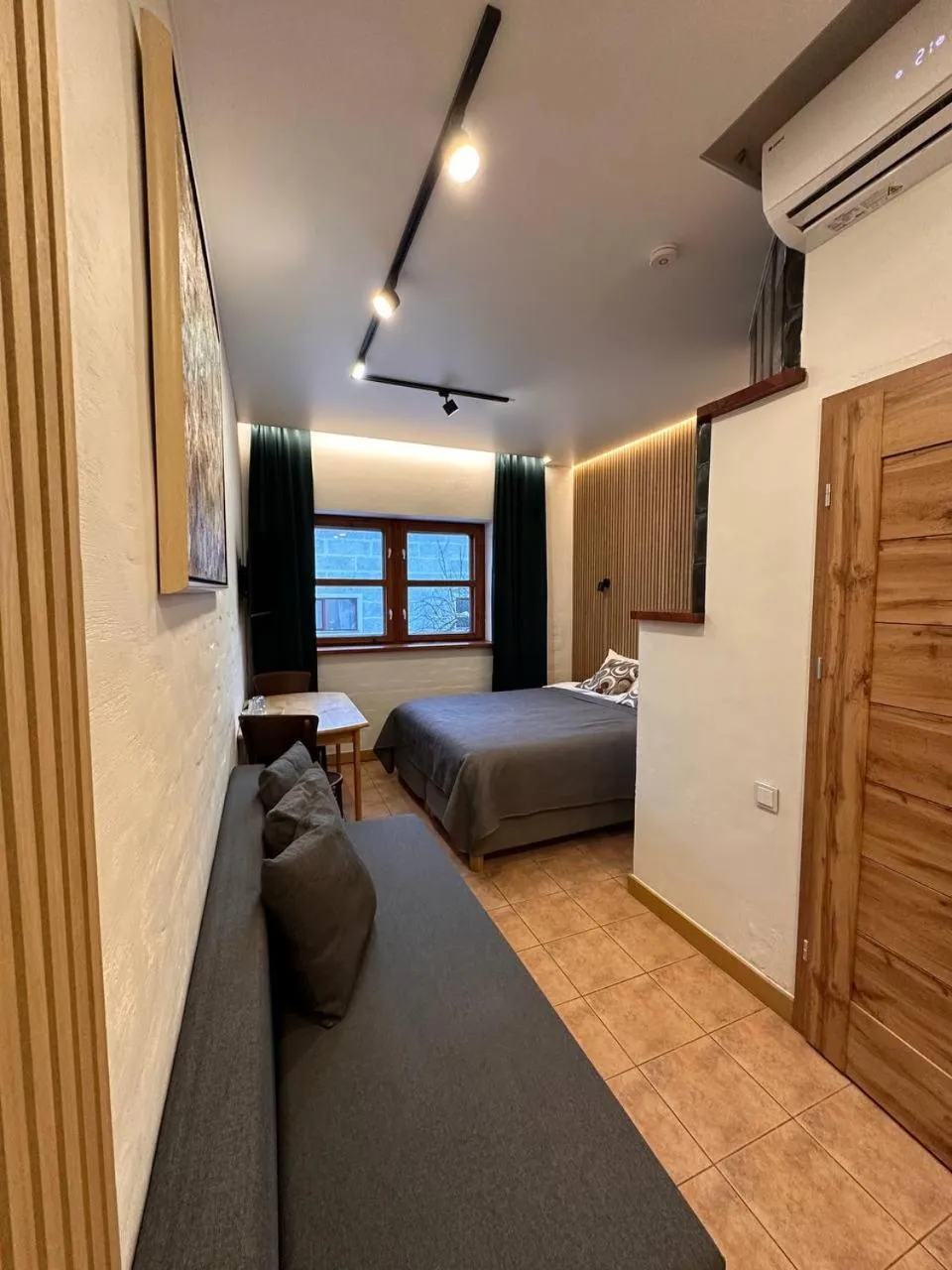 Photo of the whole room, Bed in House of Sun