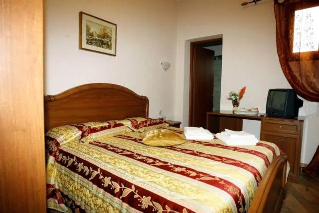 Bed in Luana Inn Holiday