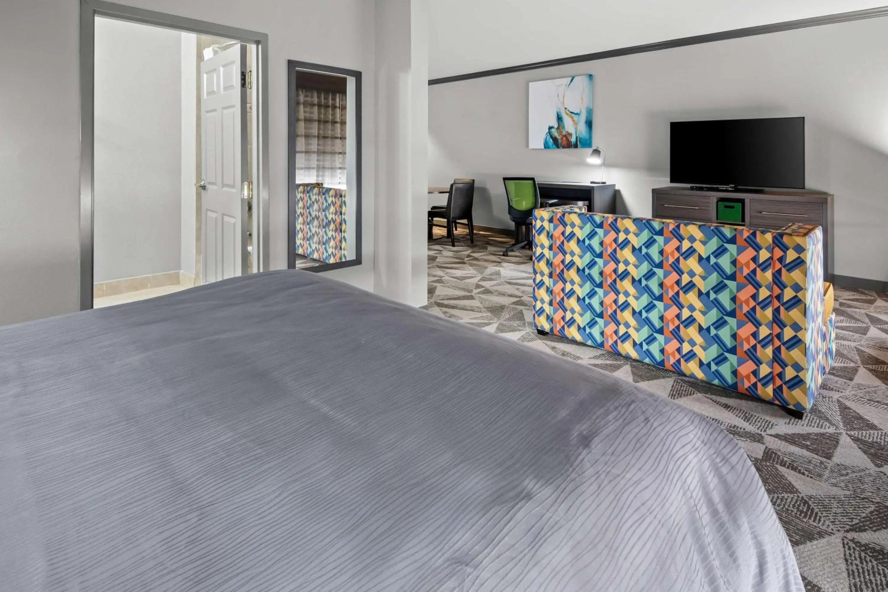 Bedroom, Bed in Big Country Hotel & Suites, SureStay Collection by BW