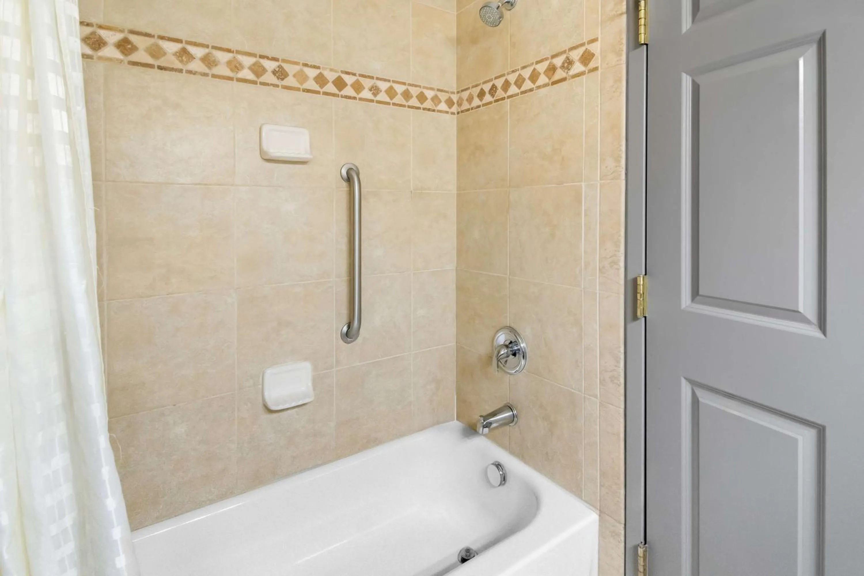 Bathroom in Big Country Hotel & Suites, SureStay Collection by BW