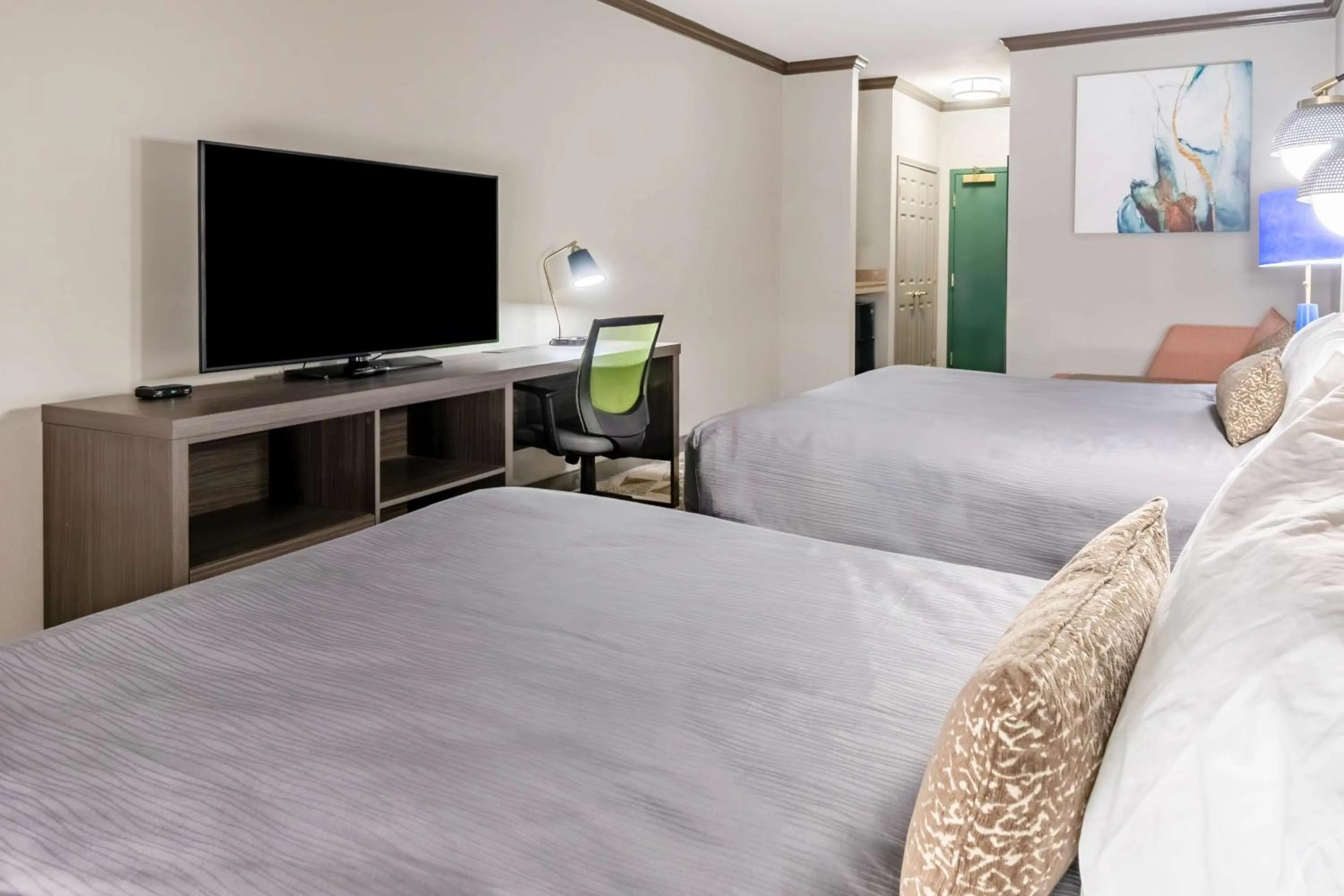 Bedroom, Bed in Big Country Hotel & Suites, SureStay Collection by BW