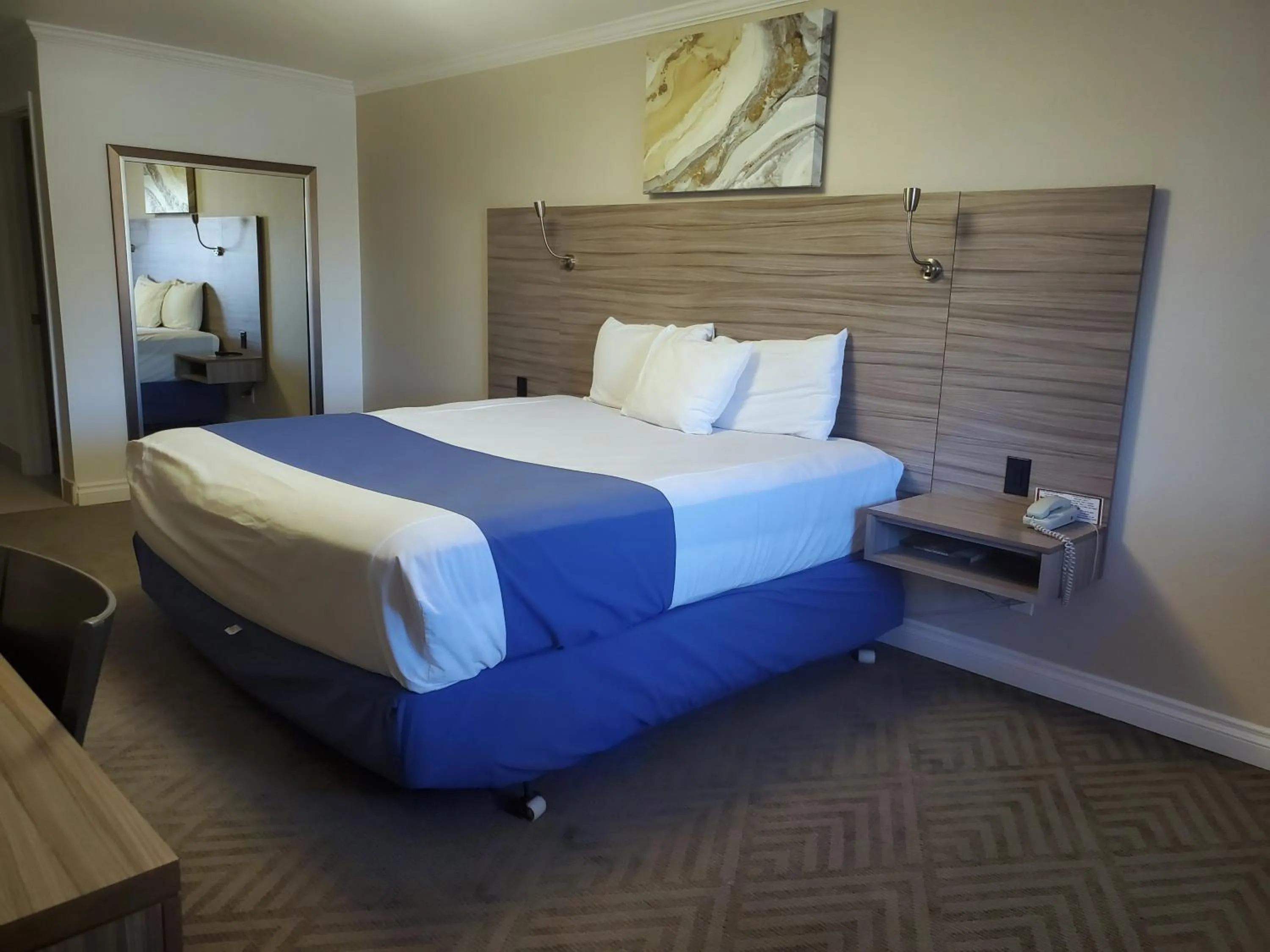 Bed in Exchange Club Motel