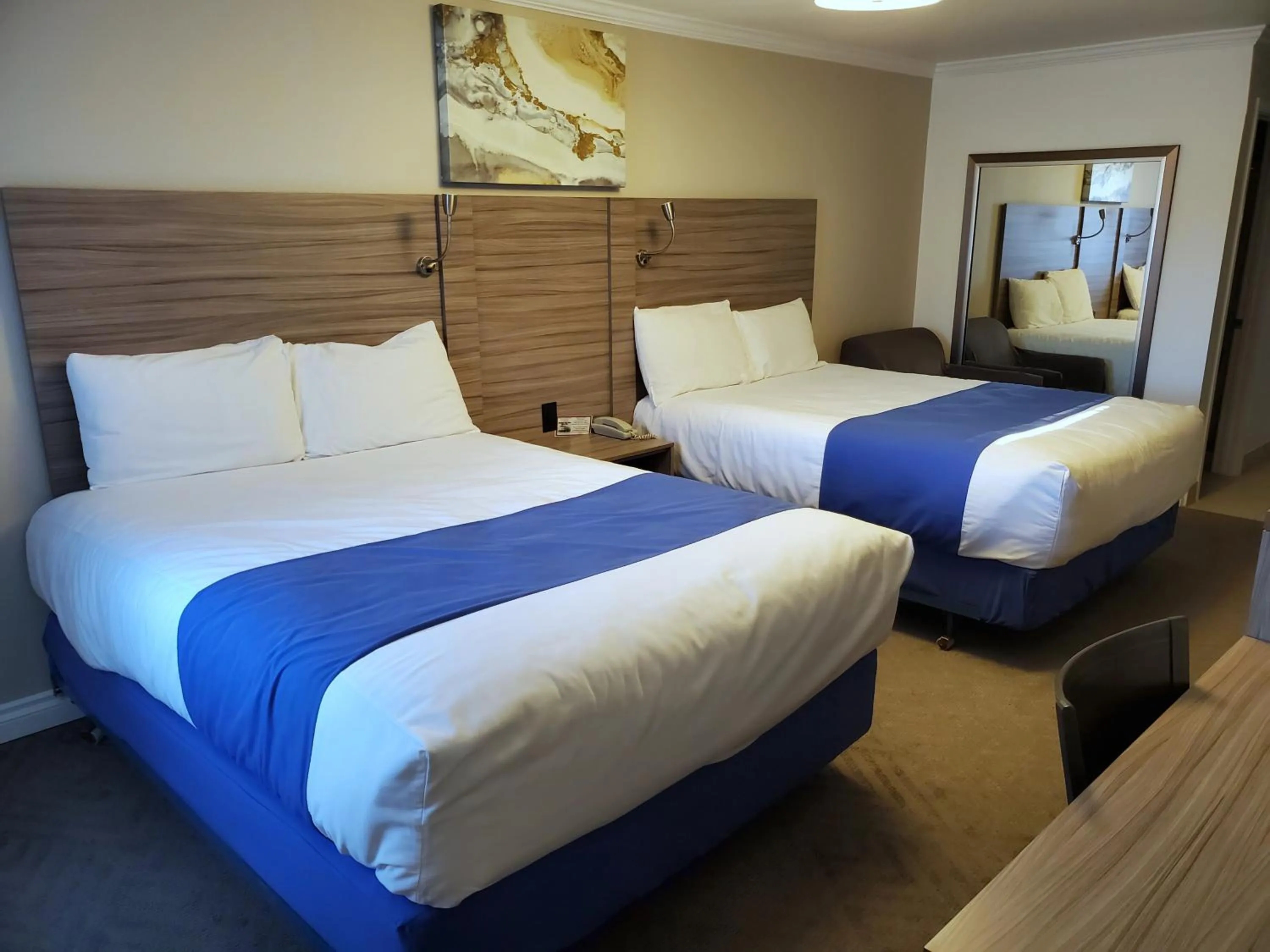 Bed in Exchange Club Motel