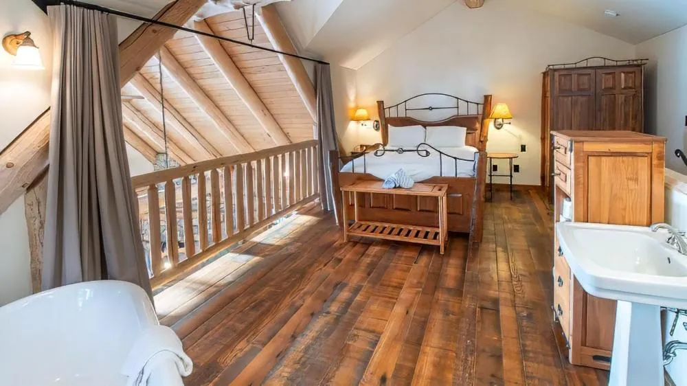 Bed in Snow Creek Cabins by Fernie Lodging Co