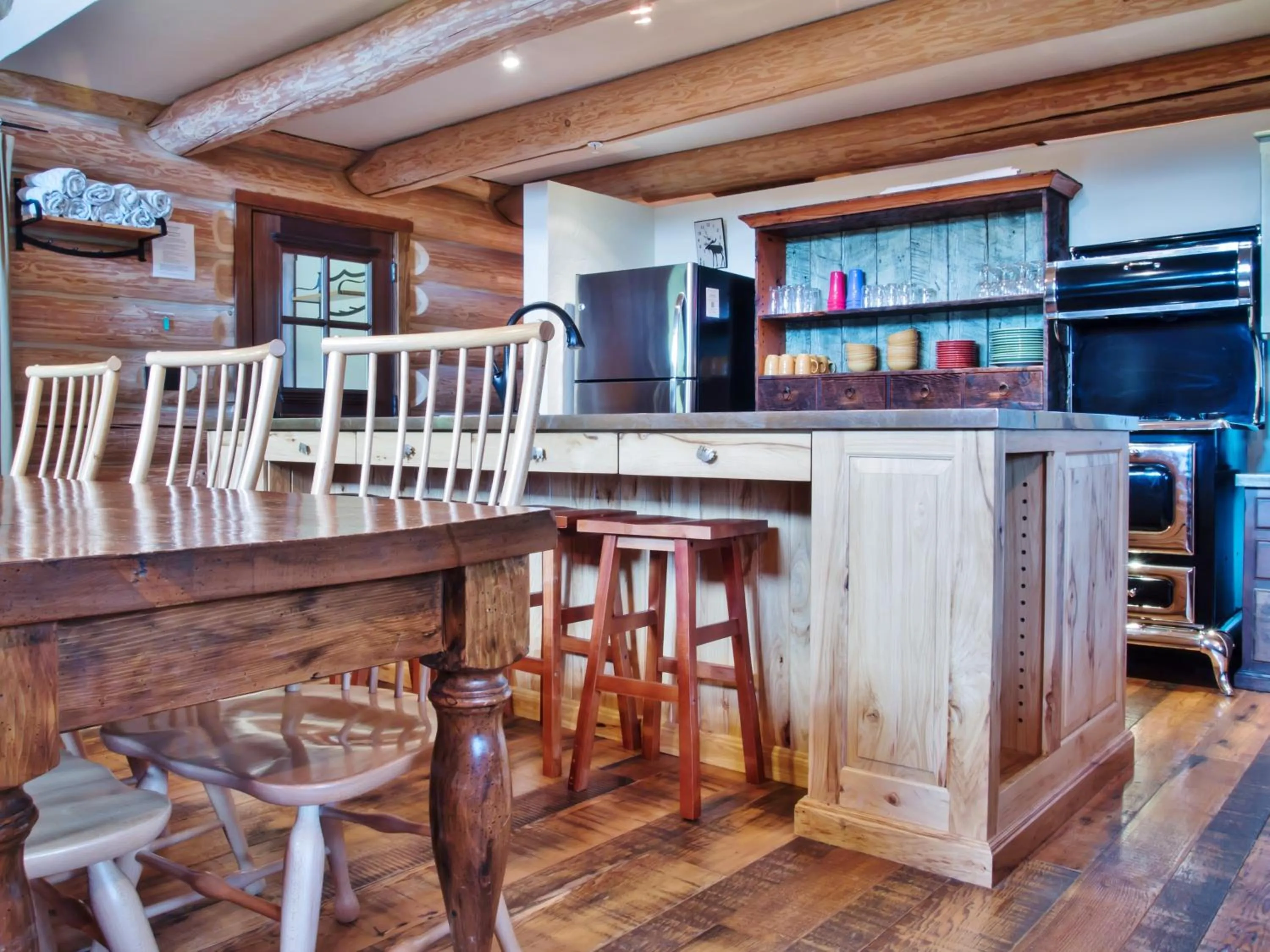 Kitchen or kitchenette in Snow Creek Cabins by Fernie Lodging Co