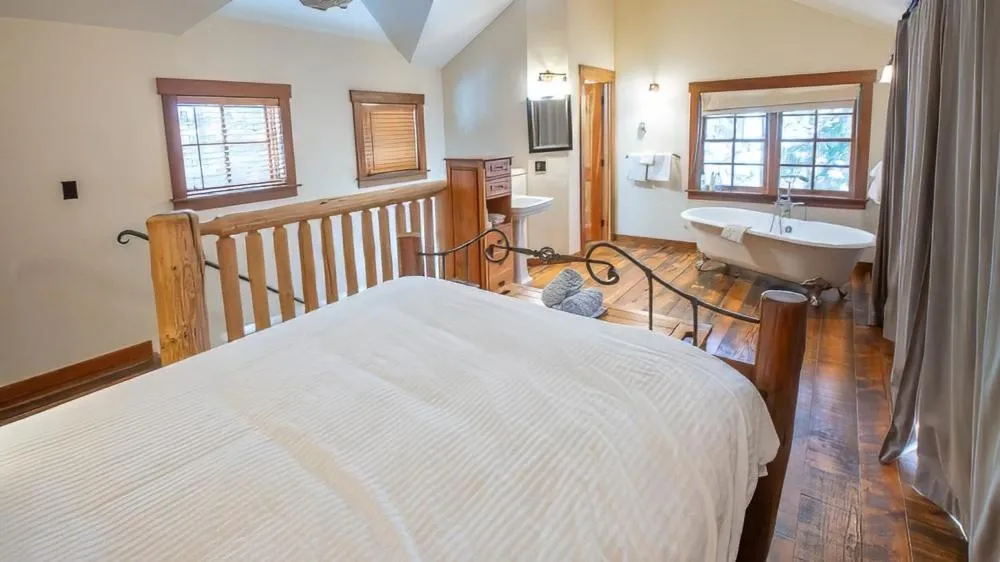 Bed in Snow Creek Cabins by Fernie Lodging Co