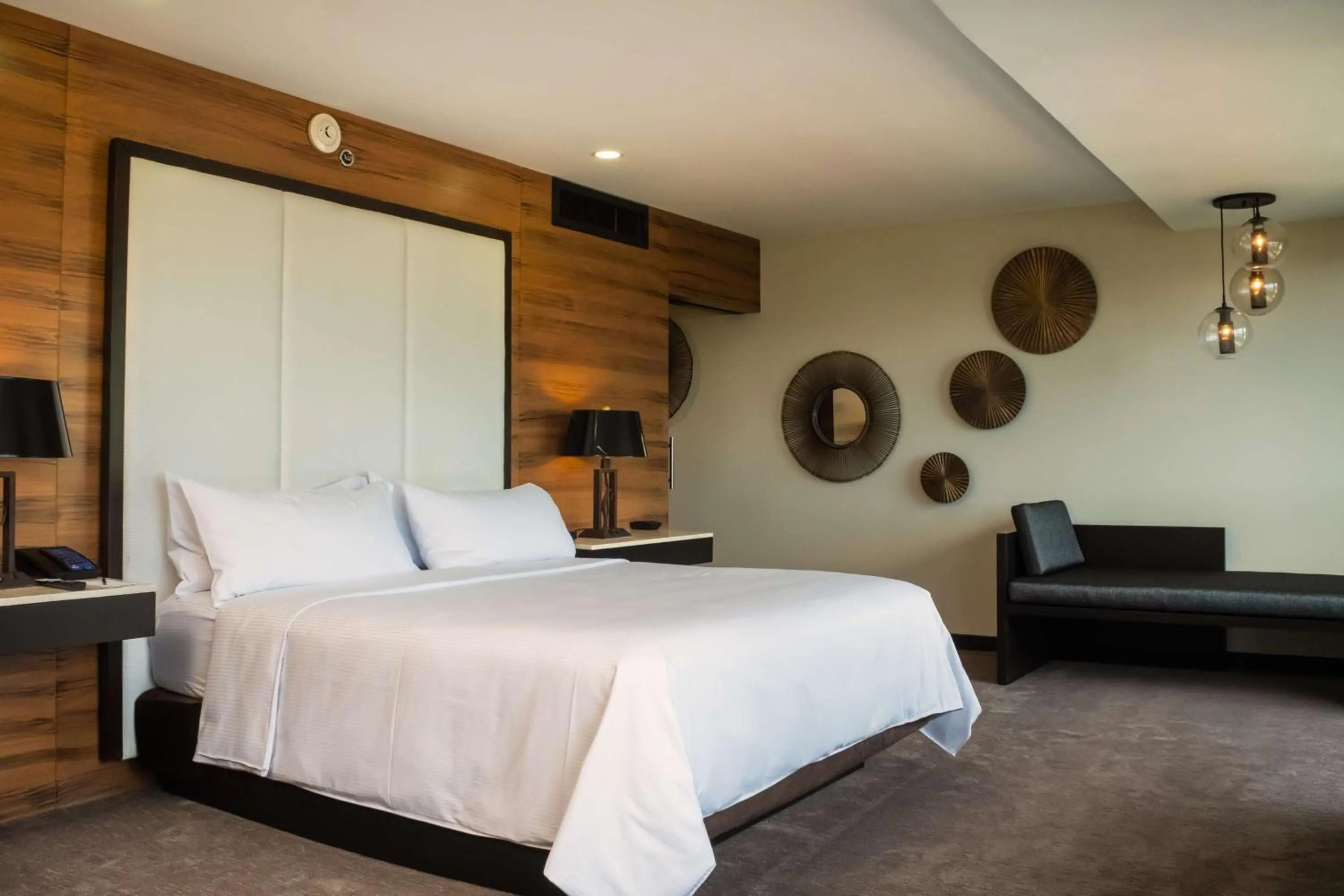 Bed in Crowne Plaza San Salvador, an IHG Hotel