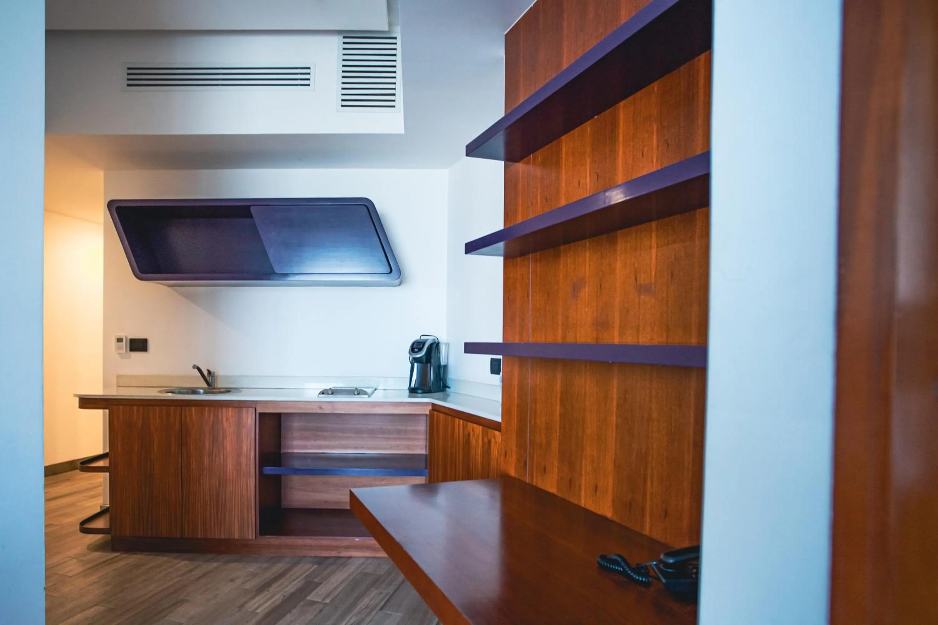 Kitchen or kitchenette in Sonata Hotel Puebla Angelópolis Distrito Sonata