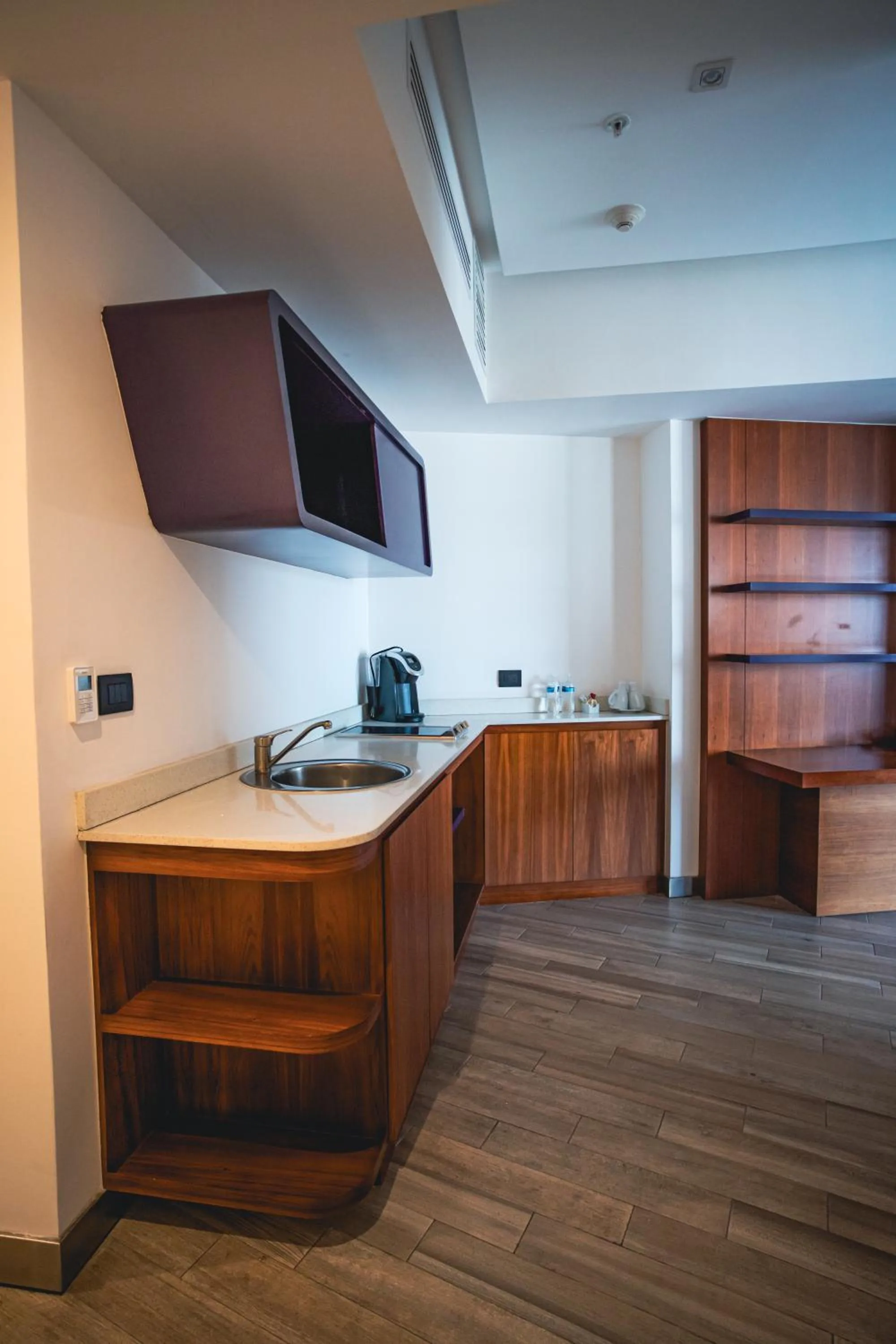 Kitchen or kitchenette in Sonata Hotel Puebla Angelópolis Distrito Sonata