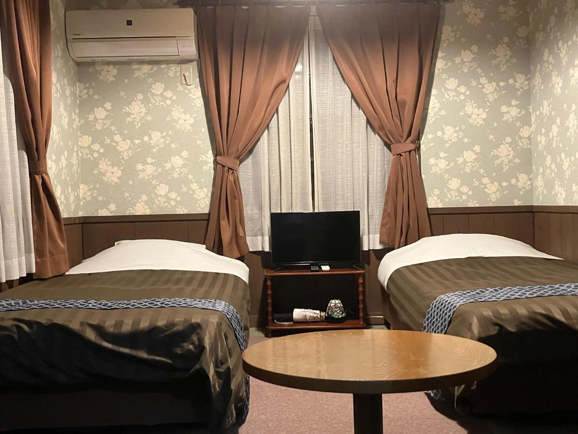 Photo of the whole room, Bed in Pension Marionette