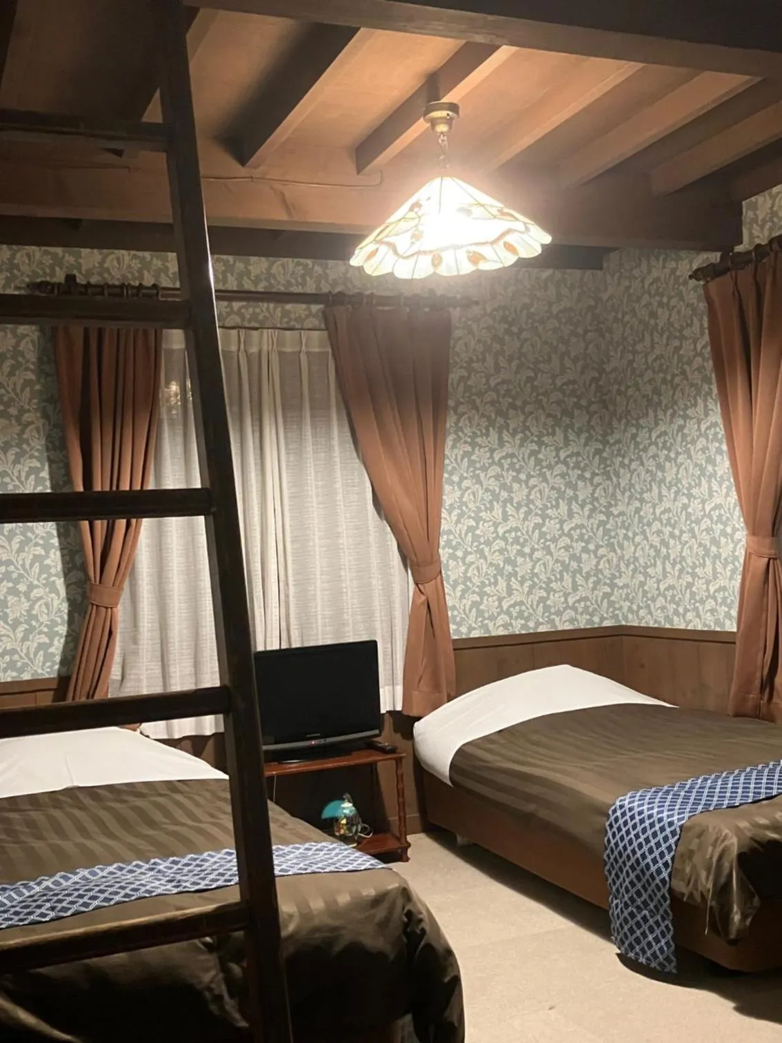 Photo of the whole room, Bed in Pension Marionette