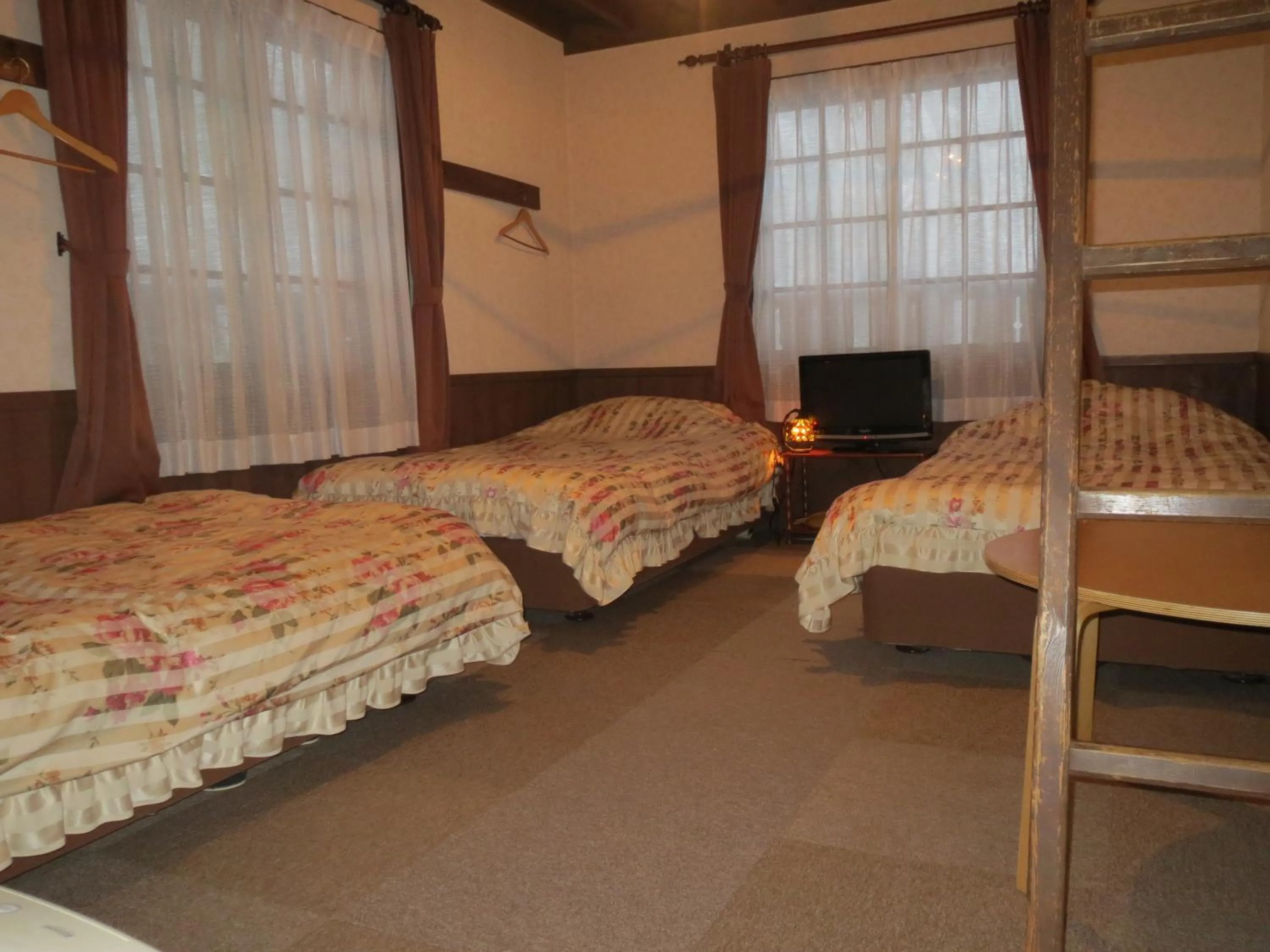 Photo of the whole room, Bed in Pension Marionette