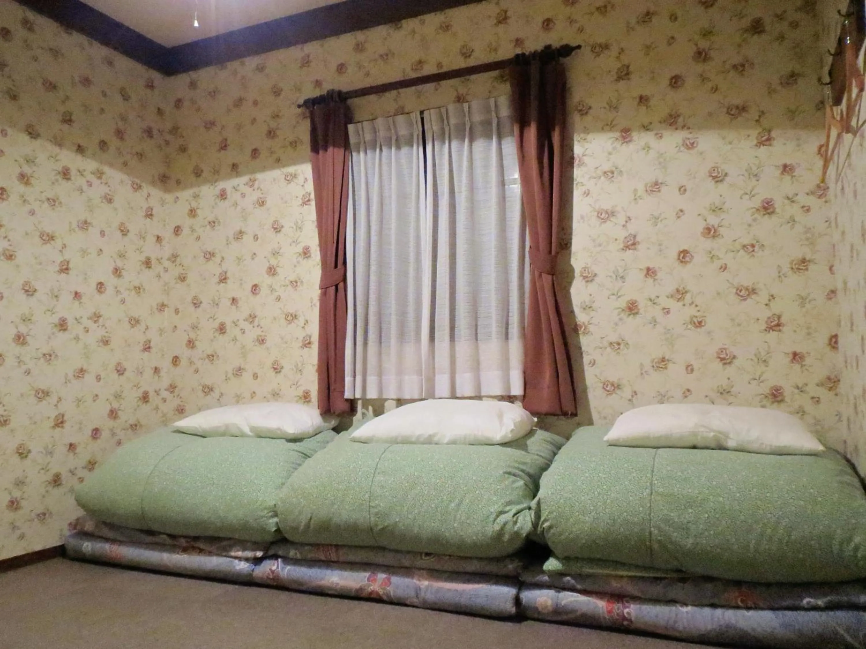 Photo of the whole room, Bed in Pension Marionette