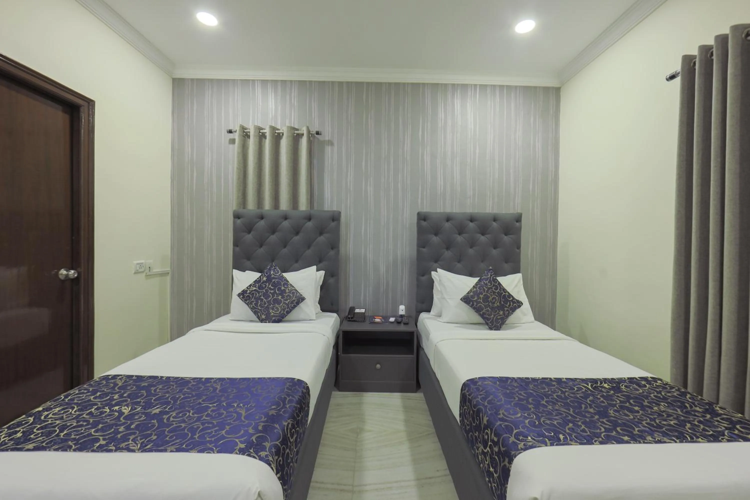 Bed in Hotel Athome & Serviced Apartments by Deccan Serai Hotels