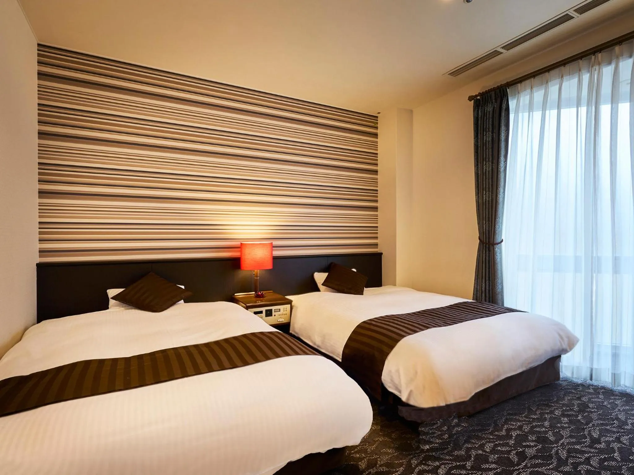 Photo of the whole room, Bed in Hotel Flags Kuju Kusima