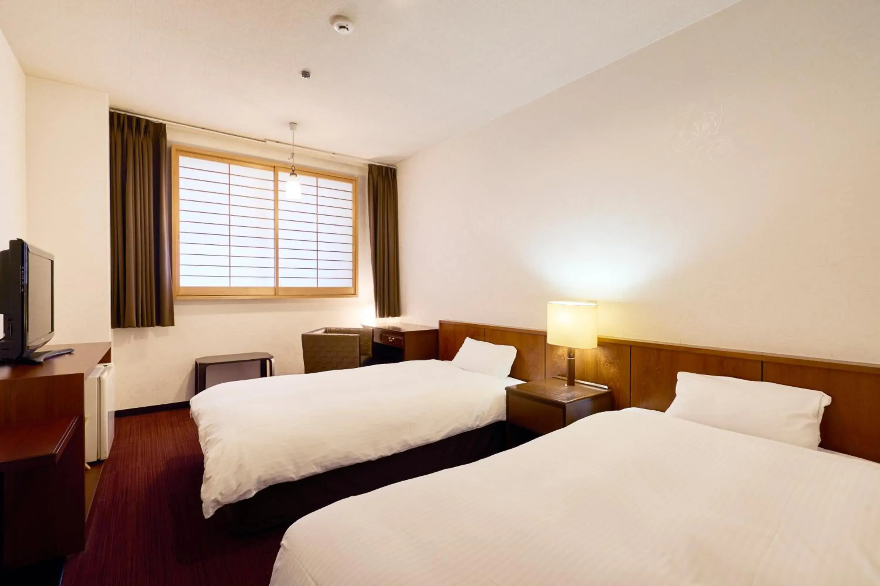 Bed in Hotel Flags Kuju Kusima Bed in Hotel Flags Kuju Kusima