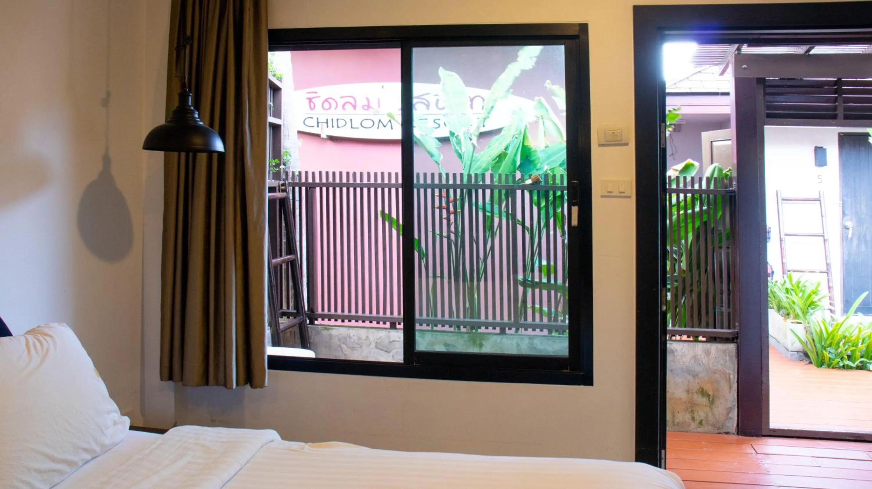 Bed in Chidlom Resort