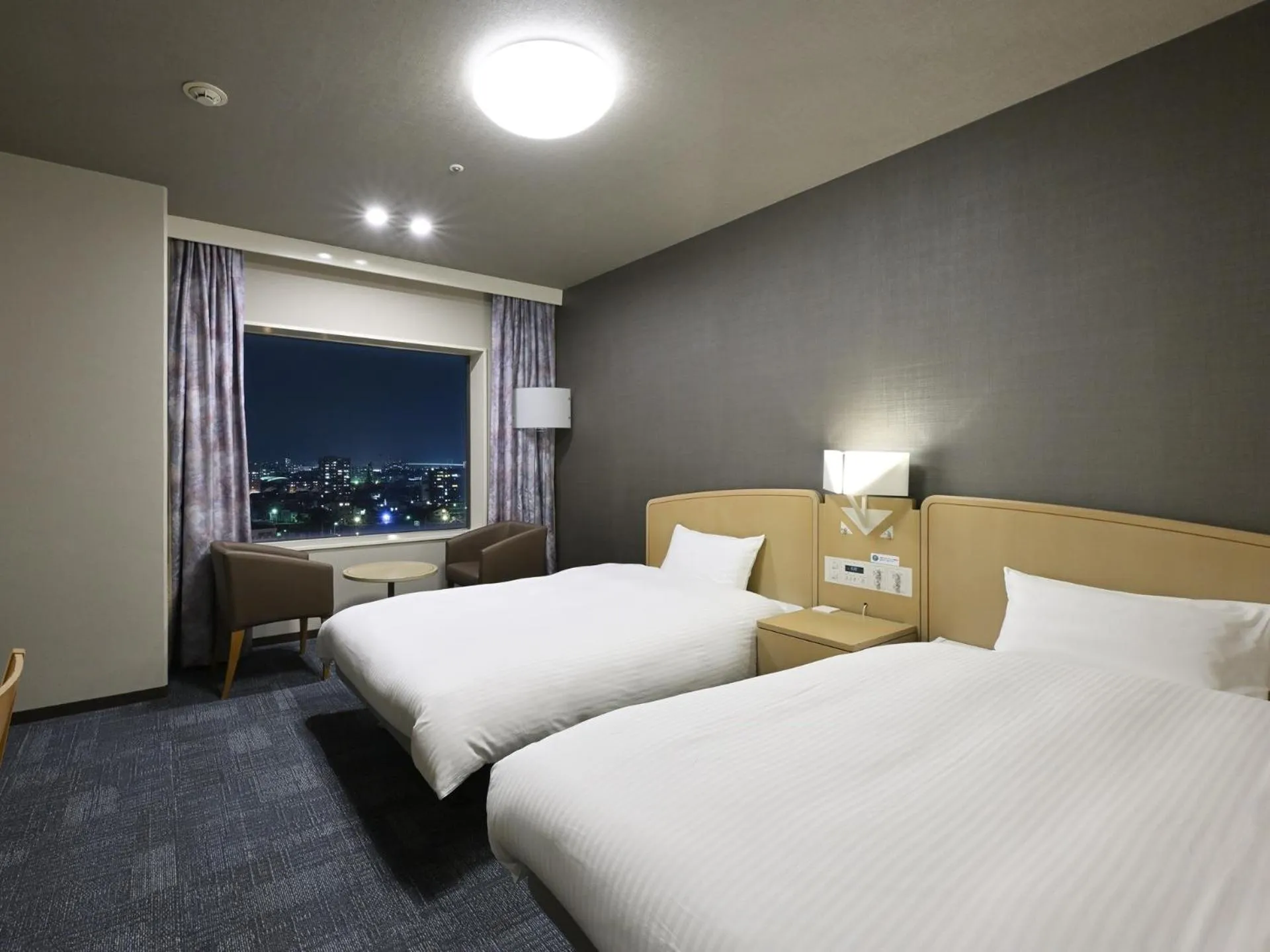 Bed in Tokushima Grandvrio Hotel