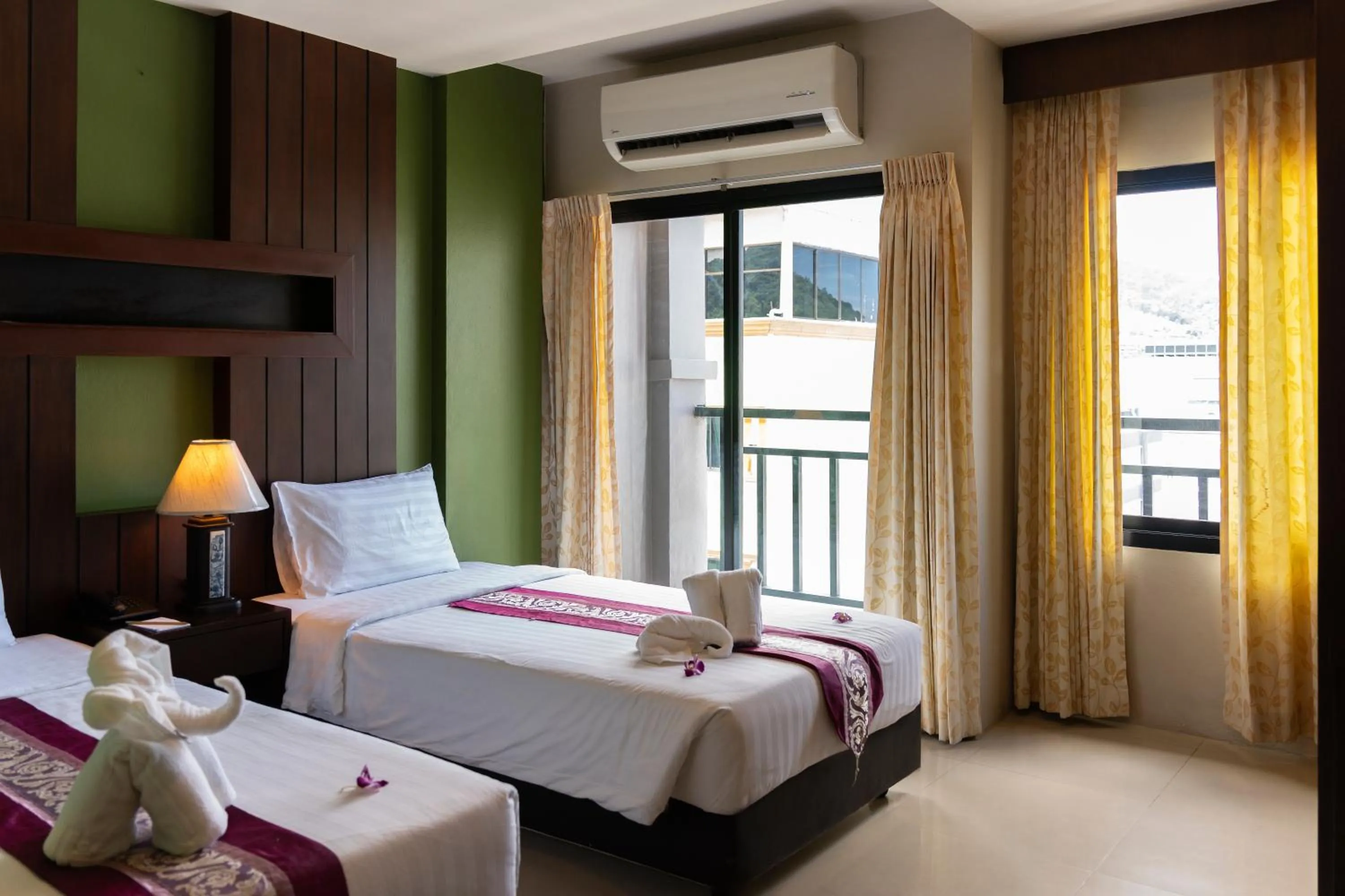 Bed in Gu Hotel Patong