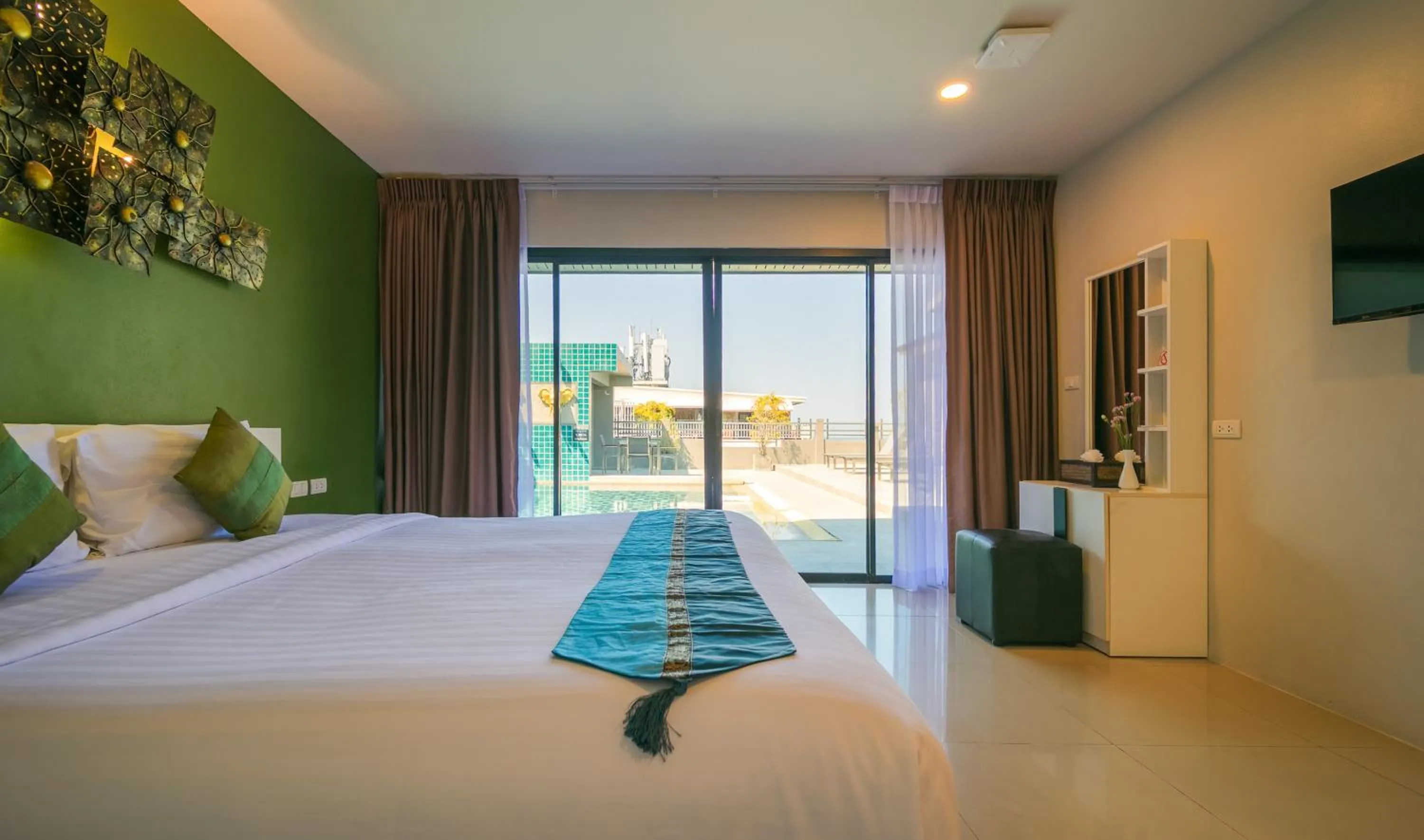 Bed in Gu Hotel Patong