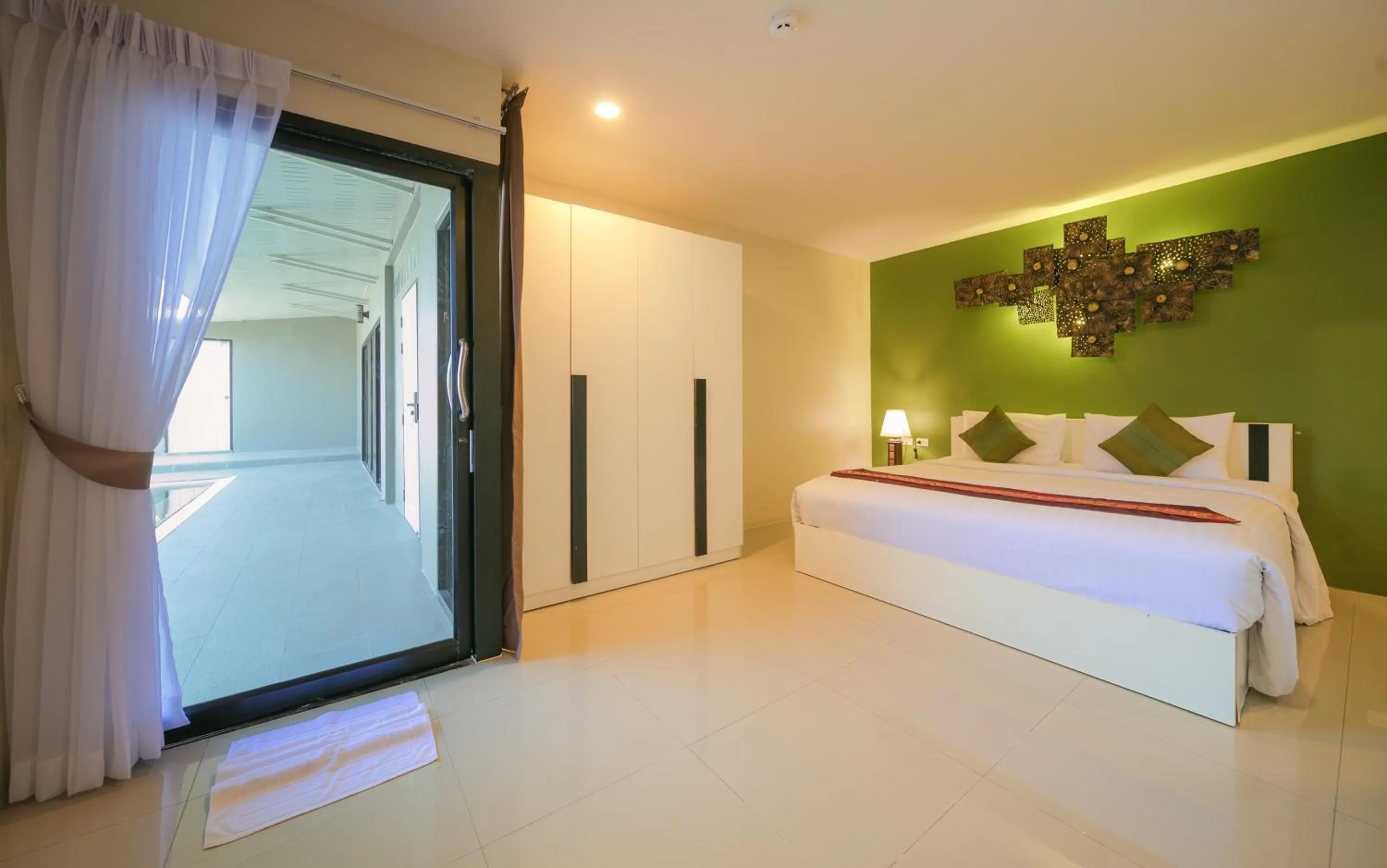 Bed in Gu Hotel Patong