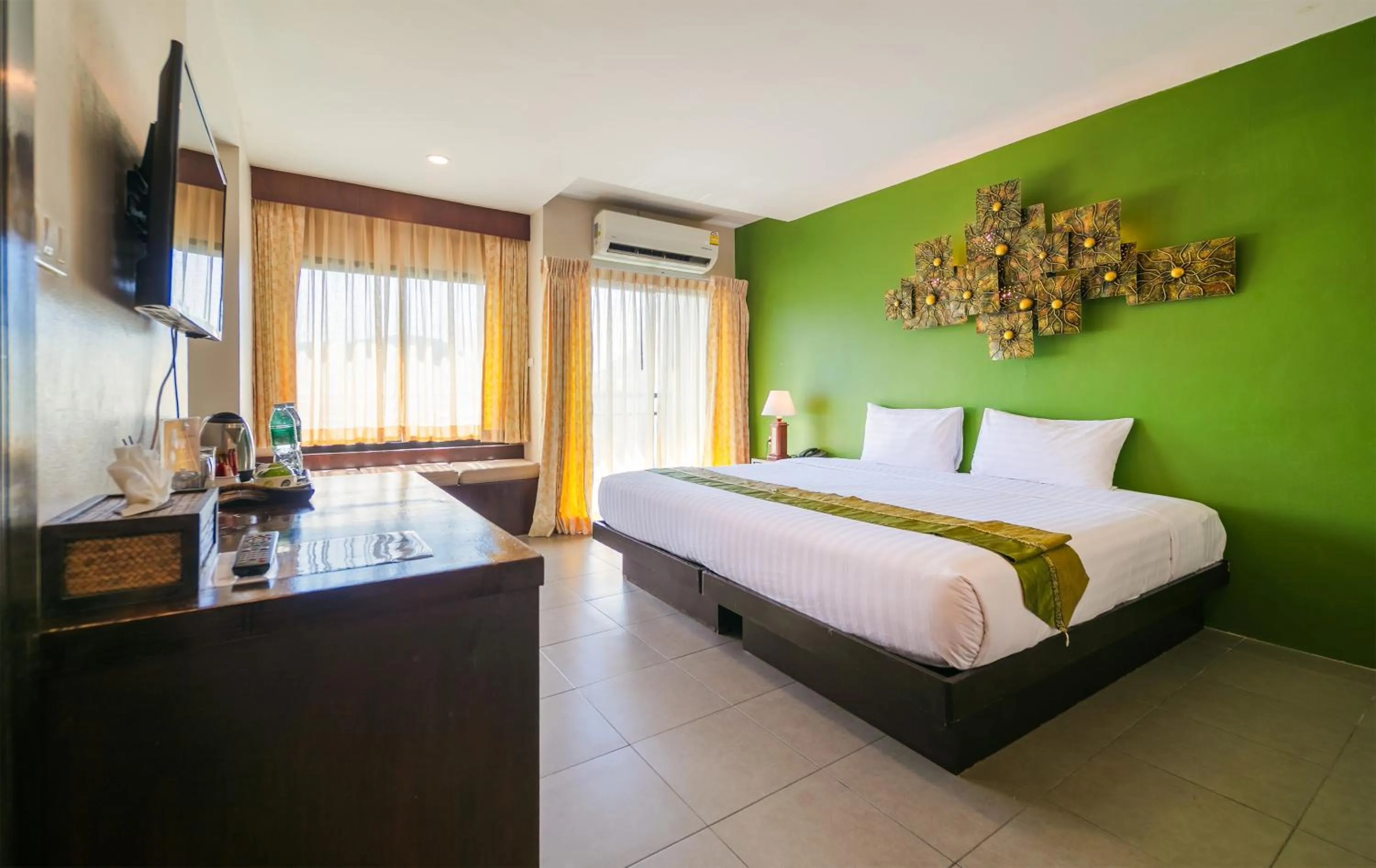 Bed in Gu Hotel Patong