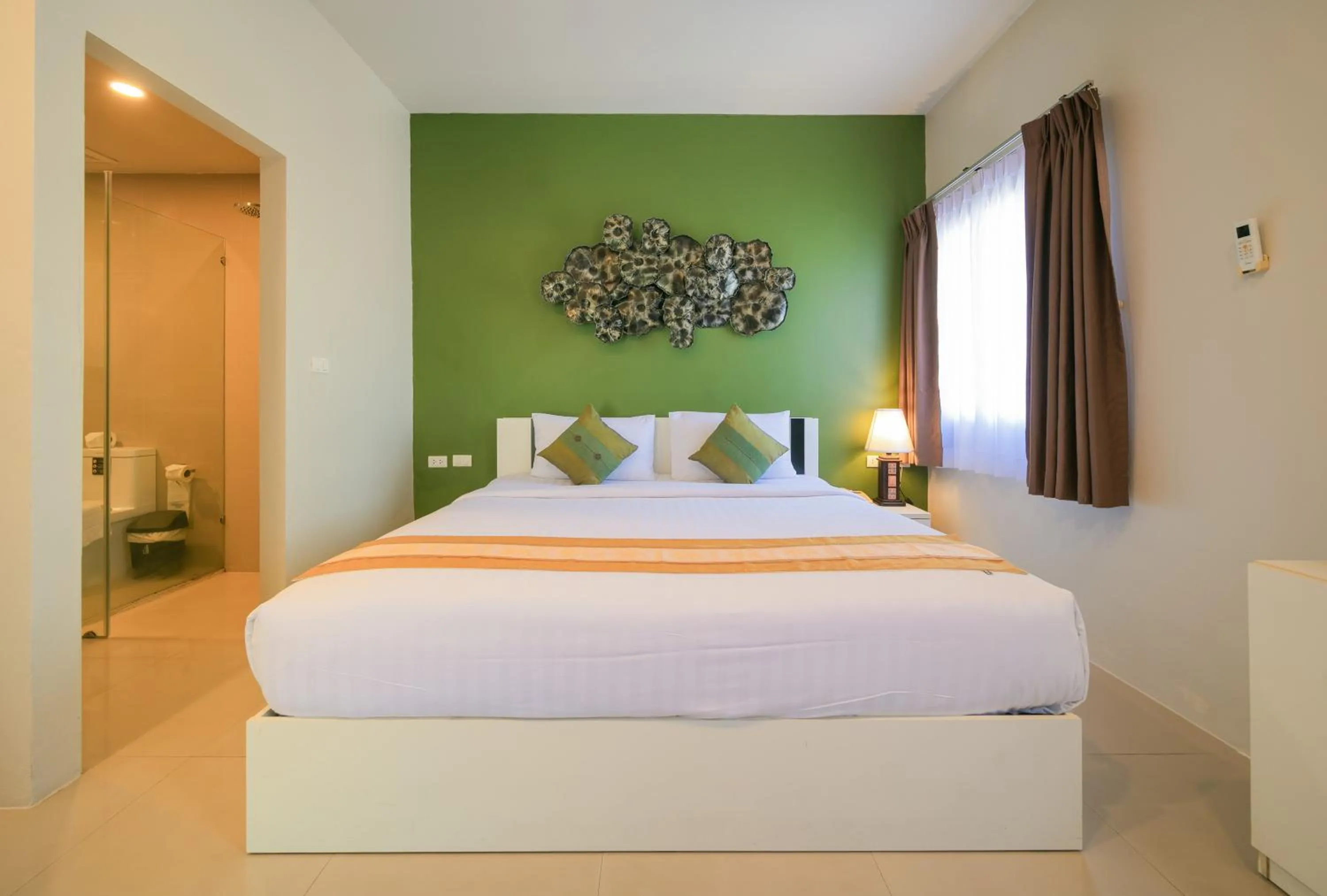 Bed in Gu Hotel Patong