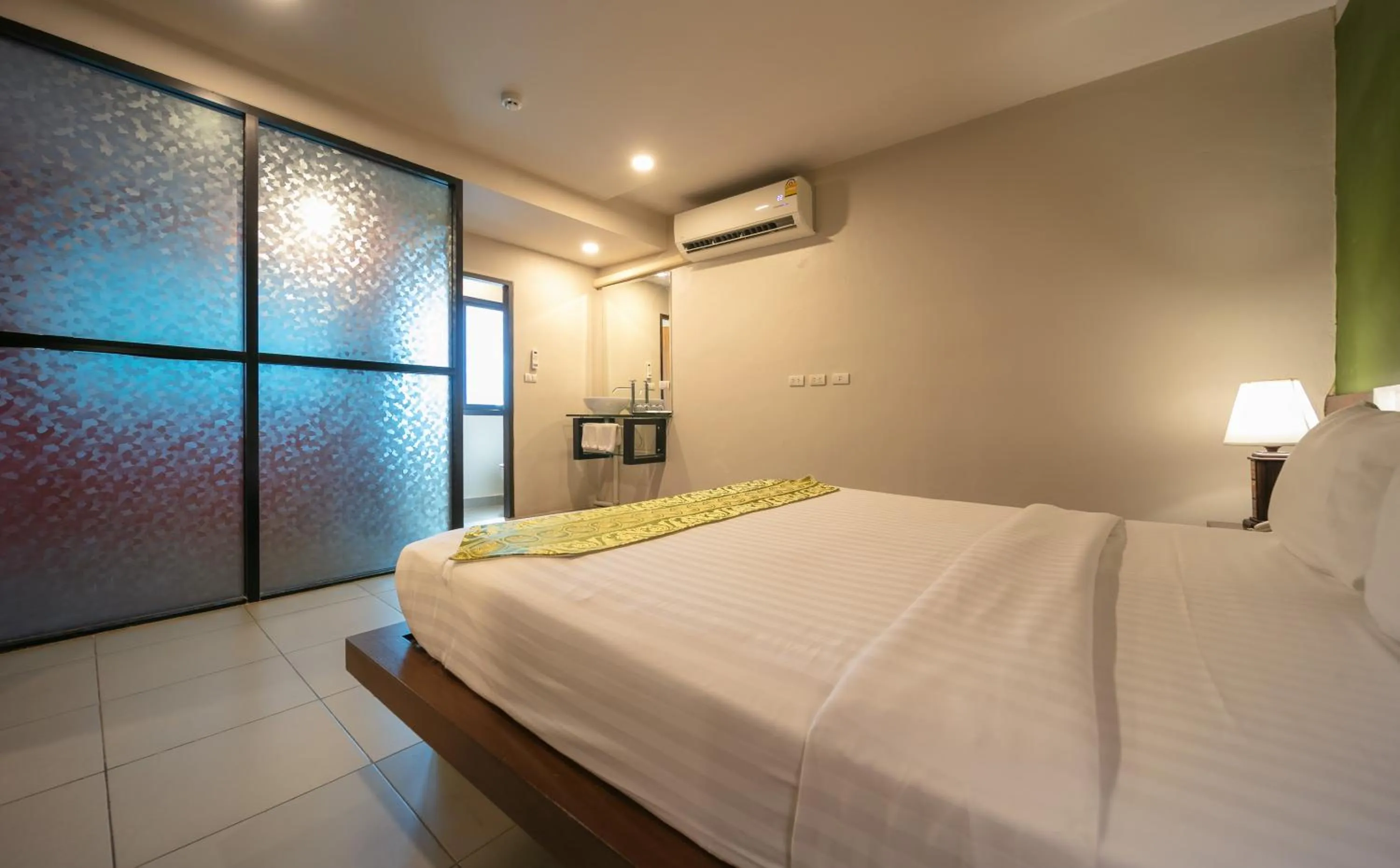 Bed in Gu Hotel Patong