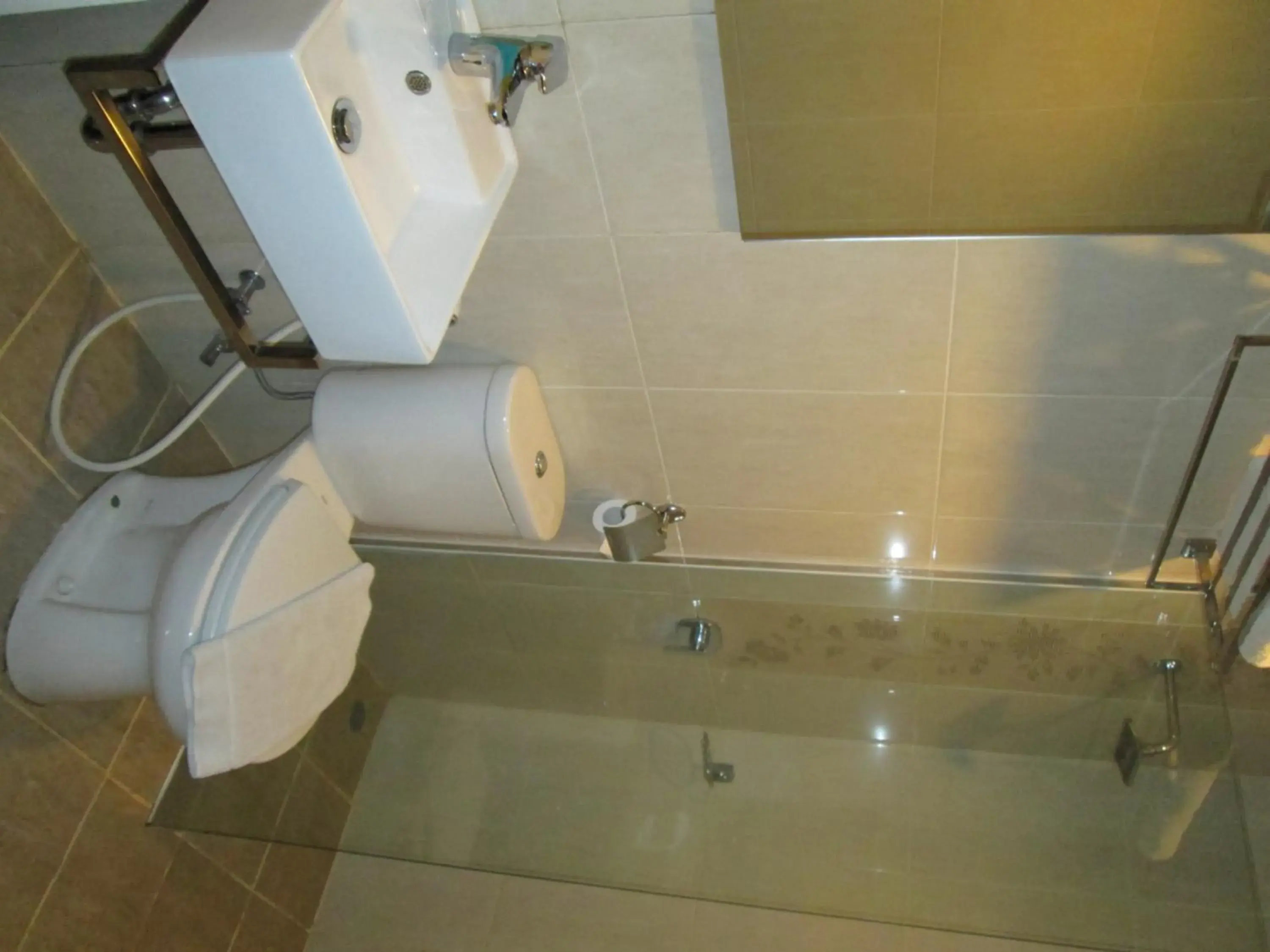 Bathroom in Vio Cimanuk Bandung - Managed By Dafam Hotels
