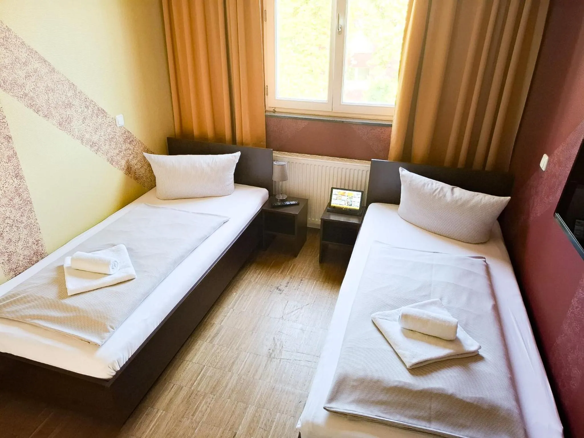 Bed in HOLI City Apart Hotel Berlin