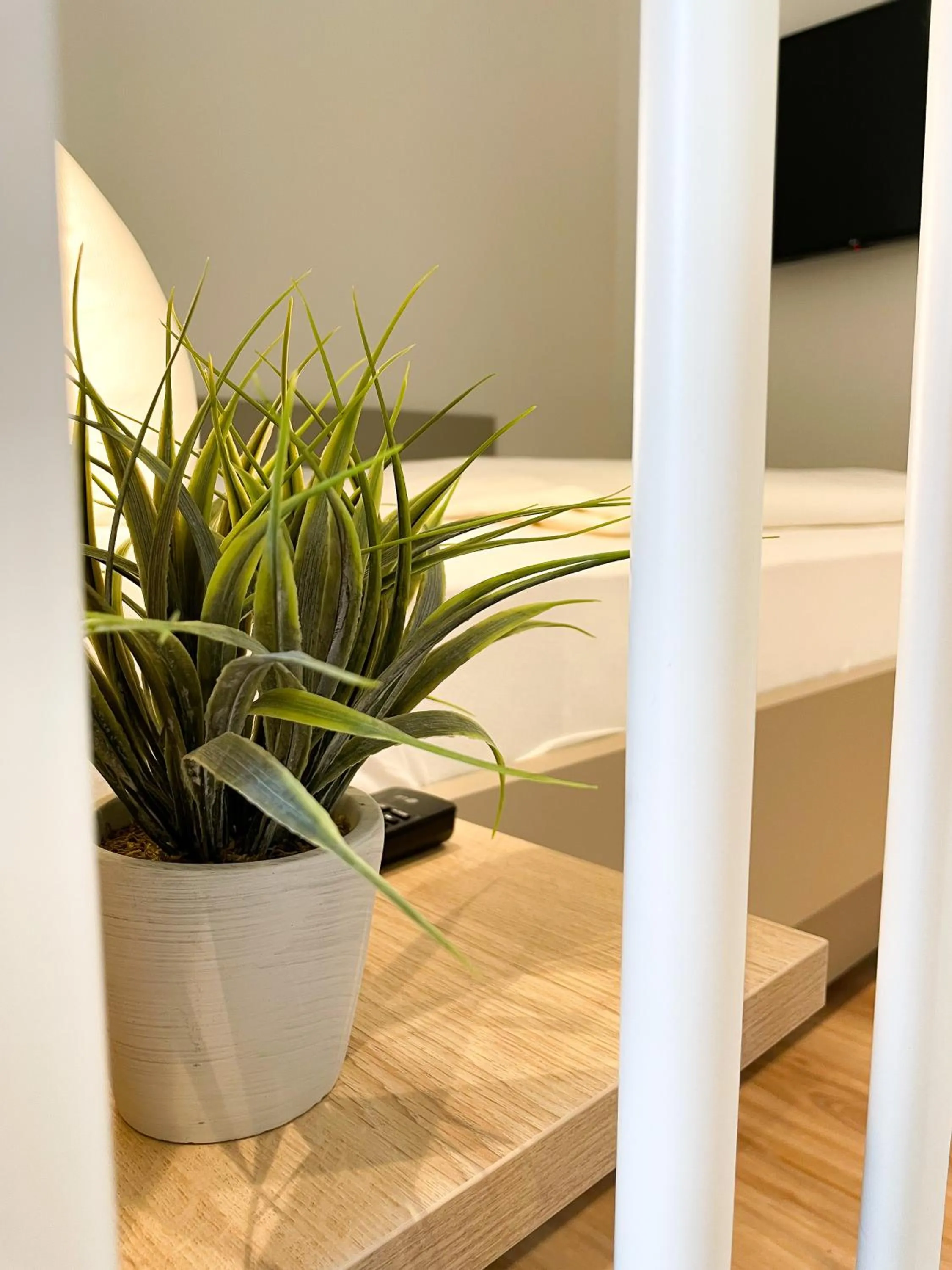 Bedroom in HOLI City Apart Hotel Berlin