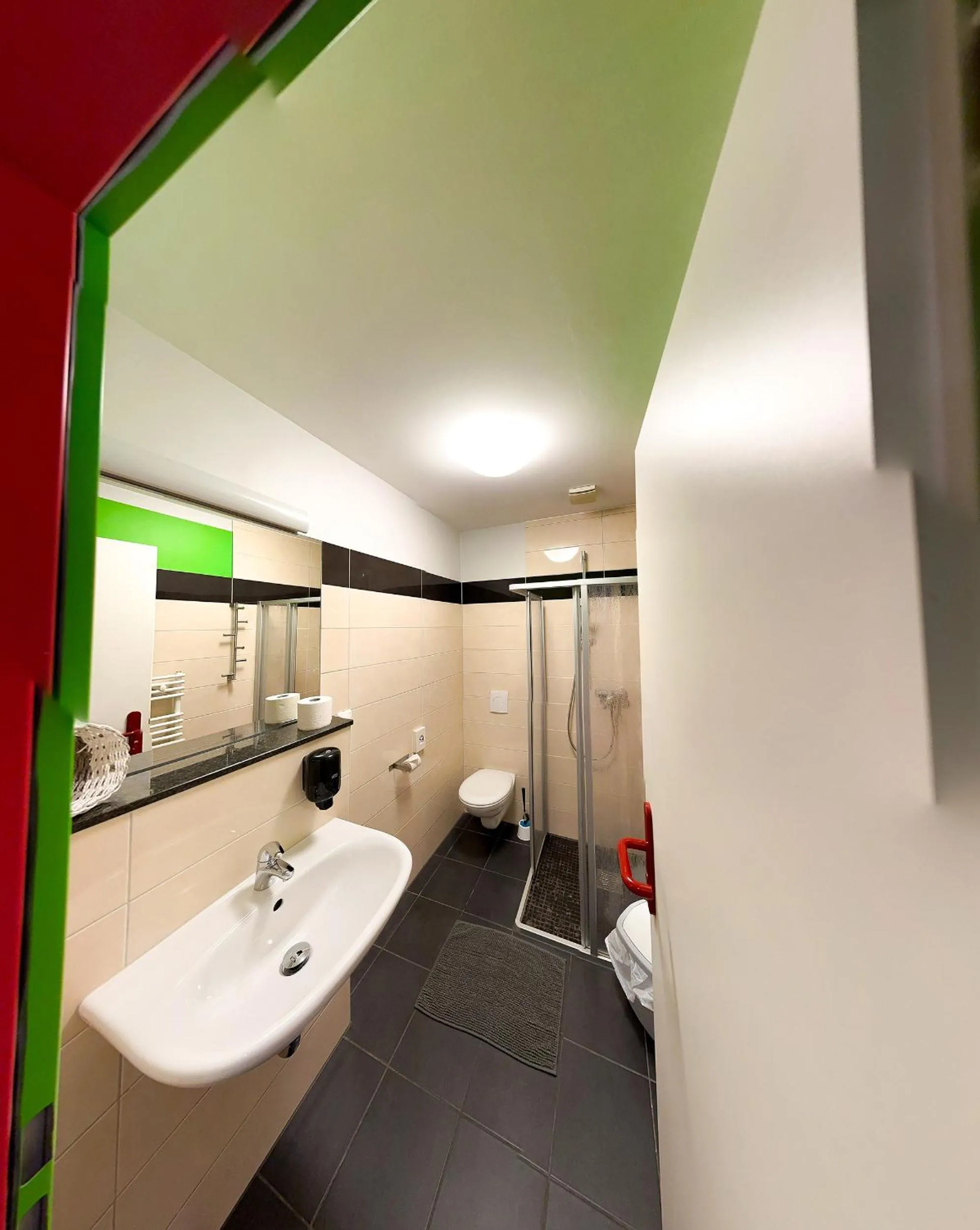 Toilet in HOLI City Apart Hotel Berlin