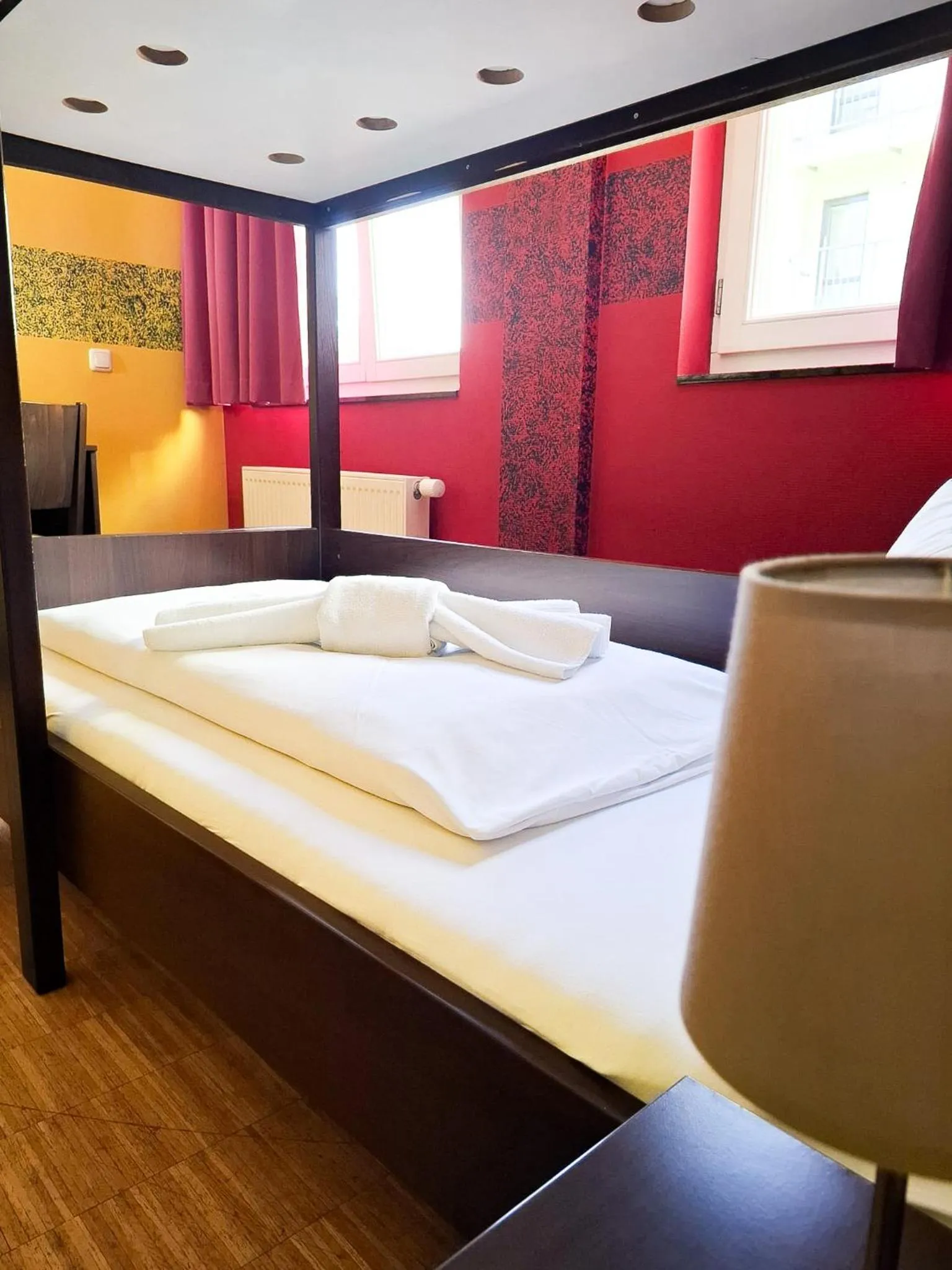 Bed in HOLI City Apart Hotel Berlin